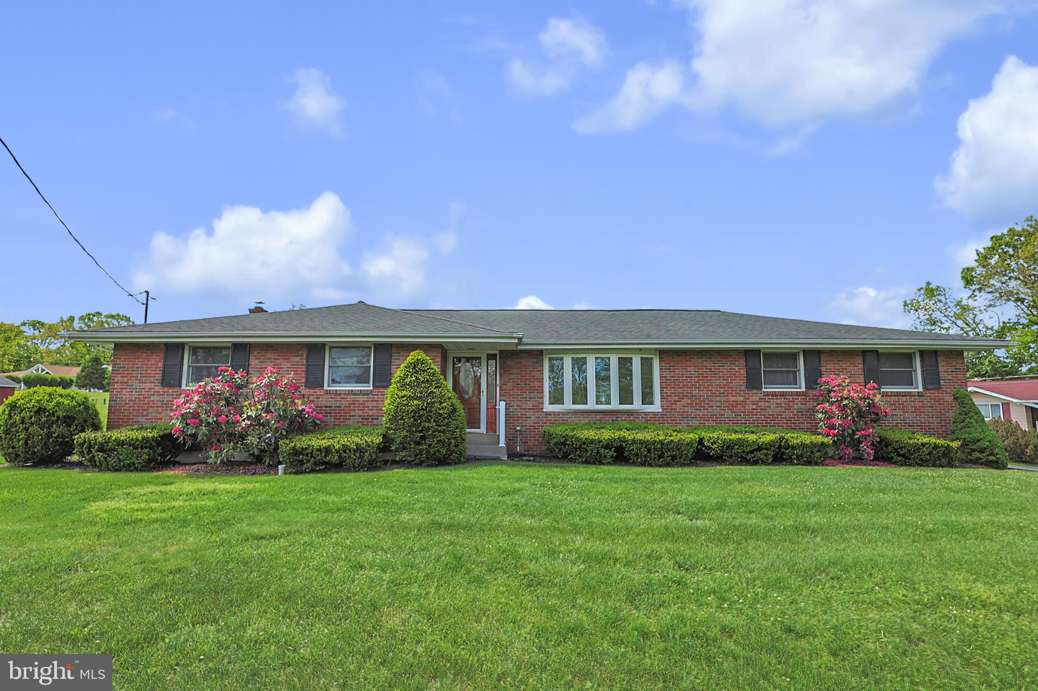 This well-maintained 3 Bed 1.5 Bath solid brick ranch is situated on a desirable corner lot in Branch Township. As you enter, you're welcomed by a tiled foyer that leads into the cozy sunken living room. Just beyond, you'll find the dining area and charming kitchen, creating a comfortable and functional layout for everyday living. The main level offers three convenient bedrooms and 1.5 baths. The partially finished lower level provides additional flexible living space, perfect for a family room, home office, hobby area, or recreation room. A built-in 21' x 21' two-car garage with tall 10-foot high ceilings offers plenty of room for vehicles, storage, or a workshop. Nestled on nearly an acre, this expansive corner property also includes two storage sheds and ample outdoor space to enjoy.  A solid home with opportunity to make it your own, packed with enormous potential. Call today to schedule your private tour!