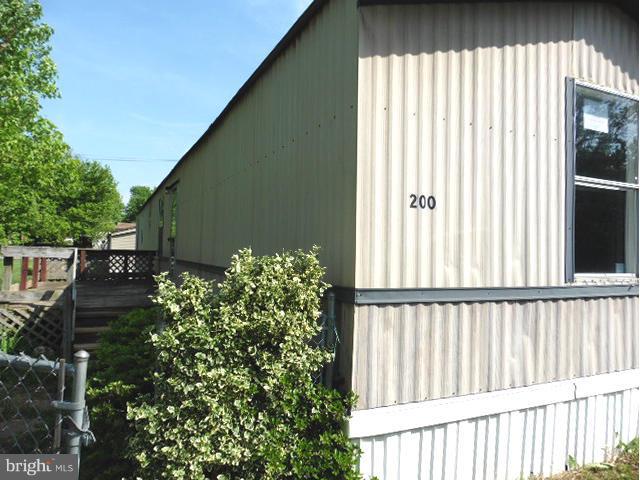RENTAL INCOME IS GOING UP EVERYWHERE!  Potential at a great price. Best fenced, large, level lot in SD. Mobile with lots of potential to be cozy home in great commuter location. Needs TLC but great home or rental property.  Seller provide up to $500 for home warranty - restrictions apply.