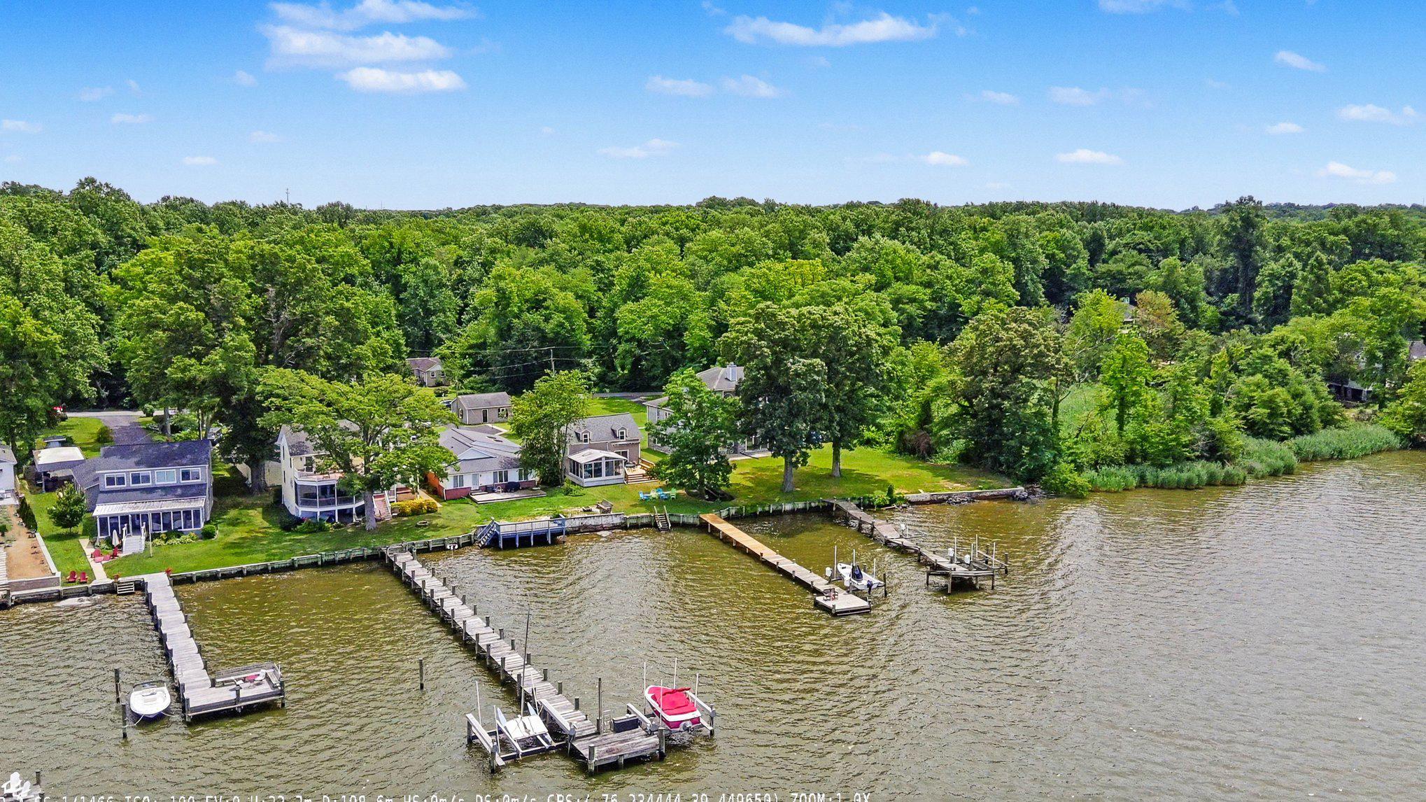Wake up to panoramic views of the Bush River and spend your days enjoying everything waterfront living has to offer. Whether it's boating, kayaking, paddleboarding, jet skiing, swimming, or simply relaxing by the water, this property puts it all just steps from your back door. The private dock, with portions replaced in April 2026, accommodates larger boats and includes a boat lift, while the new bulkhead (2024) adds peace of mind. From here, you'll have easy access to the Chesapeake Bay and countless waterfront destinations.

Inside, the open floor plan is designed for gathering, with hardwood floors, a gas fireplace, and water views that carry throughout the main living spaces. The sunroom is the perfect place to enjoy your morning coffee or unwind at the end of the day while overlooking the river. The primary bedroom opens directly onto the deck through sliding glass doors, creating an easy connection to the outdoors and offering beautiful water views to start and end each day.

The home offers four bedrooms and two full baths, along with thoughtful updates that make ownership easier, including dual-zone heating and air, owned solar panels, and a new roof, gutters, and siding completed in 2020. A detached two-car garage provides additional parking and workspace, while the separate bath house offers extra storage for all your boating and outdoor gear. There's even a large attic storage area, easily accessed through the upstairs bedroom closet.

An added bonus is the voluntary HOA, giving owners the opportunity to participate in the community without mandatory association fees or restrictions.

If you're looking for a home where weekends revolve around life on the water instead of traffic to get there, this Bush River property delivers the lifestyle you've been waiting for.