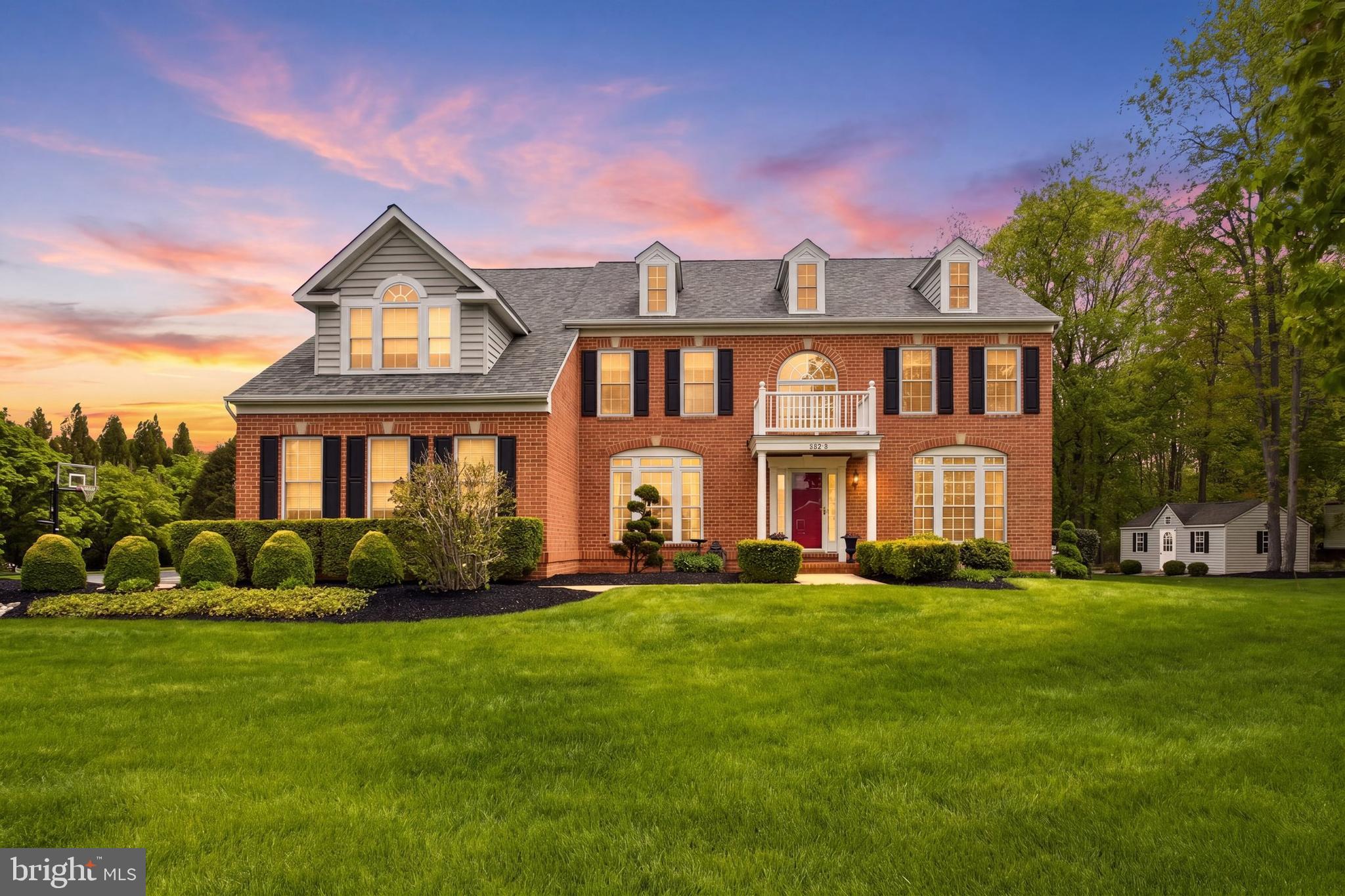 Experience refined luxury, sophistication, and privacy in this exceptional three-level estate built by renowned custom home builder Grayson Homes, located in the prestigious River Downs community and ideally positioned to enjoy the highly anticipated golf course grand opening on June 1, 2026. Set on a beautifully manicured, expansive flat homesite, this remarkable residence offers a serene and elevated lifestyle with breathtaking surroundings and exceptional privacy.

Thoughtfully updated with major recent improvements, the home features a new roof (2023), new upstairs HVAC system (2023), new hot water heater (2025), new well pump (2025), new double ovens (2025), and a new refrigerator (2026).

Soaring ceilings, abundant natural light, and grand living spaces create an immediate sense of timeless elegance, while the formal dining room seamlessly flows into a gourmet kitchen appointed with stainless steel appliances, double ovens, a large center island, and extensive cabinetry. The inviting family room is anchored by a striking wood-burning fireplace, creating the perfect gathering space for both intimate evenings and large-scale entertaining.

The upper level offers a luxurious private retreat highlighted by an expansive primary suite featuring a spa-inspired bath, oversized custom walk-in closet, and a versatile sitting room ideal for a private lounge, executive office, or fitness space. A secondary en-suite bedroom, two additional generously sized bedrooms, and an updated full bath complete the upper level with exceptional comfort and functionality.

Designed for resort-style living, the walkout lower level showcases a spacious lounge and theater area, elegant wet bar, full bath, and a private guest suite ideal for extended stays or multigenerational living. Outdoors, the breathtaking backyard sanctuary offers sweeping open views and exceptional privacy, creating an extraordinary backdrop for entertaining or peaceful everyday living.

This remarkable home  presents a rare opportunity to experience luxury living in one of the area’s most coveted communities.