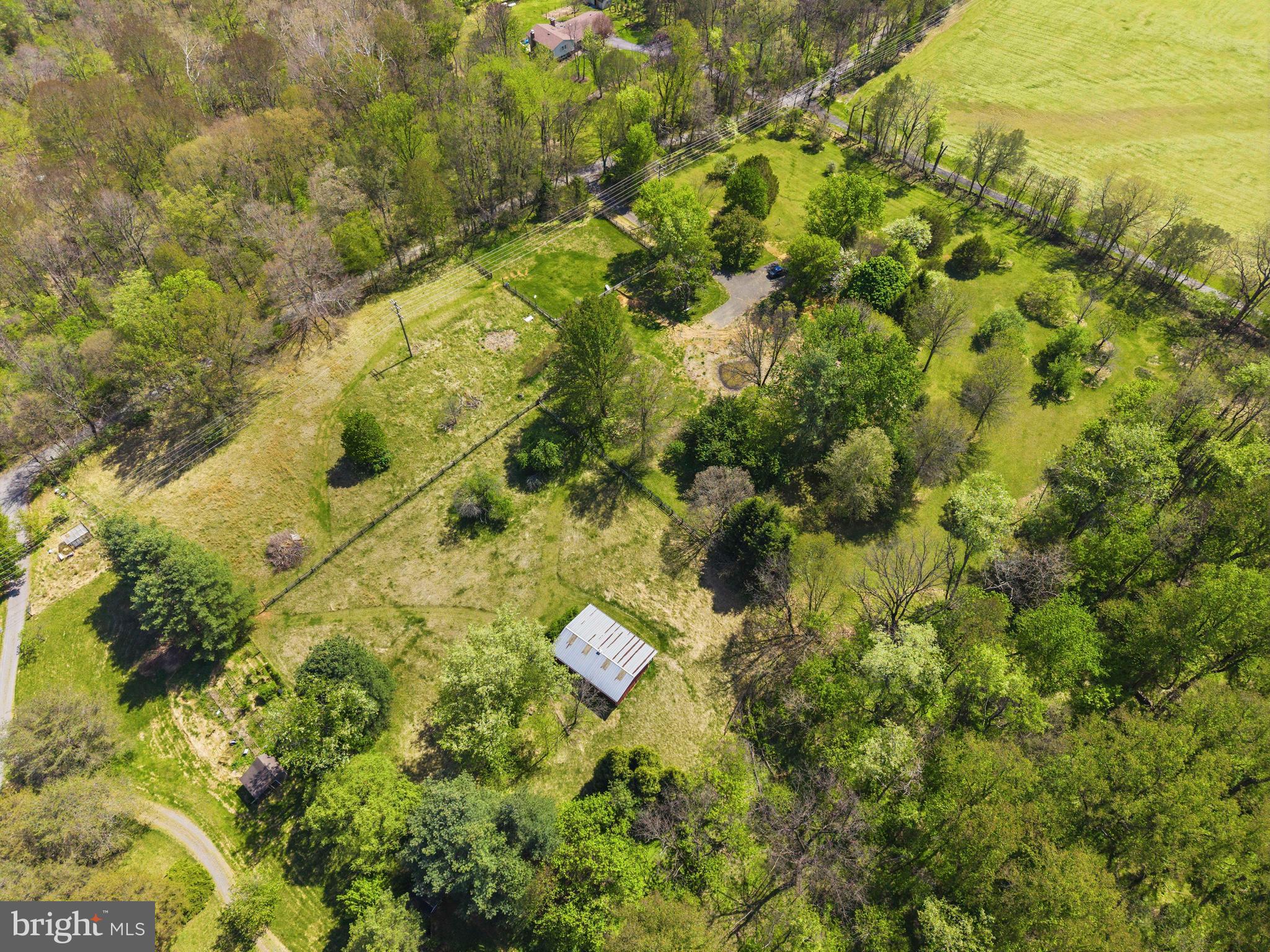 Proposed and negotiable home site offering approximately 5,000 square feet of living space, currently priced at $1.8M, which includes a stunning 10-acre lot. This is a fully customizable opportunity—buyers can build to suit their needs, and pricing may vary depending on final design and specifications.

The current concept features a 4-bedroom home, with flexibility to add additional rooms or tailor the layout to your lifestyle. The property is already well-prepared with existing infrastructure, including electric, septic, and well in place.

A charming existing barn adds character and functionality, while a peaceful creek runs along the back of the property, enhancing the natural beauty and privacy of this unique setting.