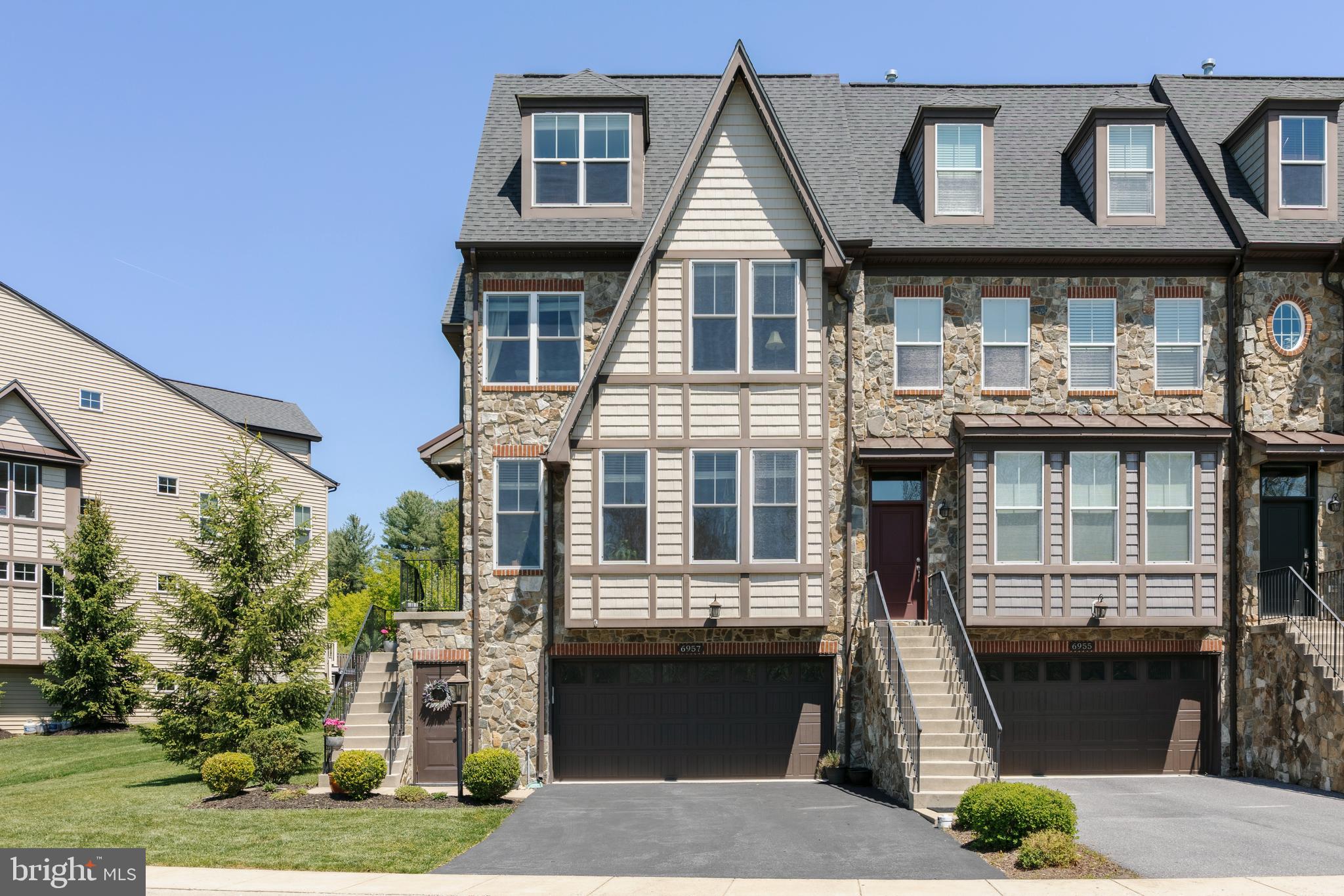 Set within the sought-after West Winds community near Lake Linganore and Linganore Winecellars, this exceptional four-level end-unit townhome offers a rare combination of scale, light, and thoughtful design.

From the moment you enter, the home reveals itself through clean architectural lines and an abundance of natural light, enhanced by its premium end-unit positioning. The main level unfolds seamlessly, anchored by a beautifully appointed kitchen featuring quartz countertops, an expansive island, and refined finishes that balance elegance with everyday functionality. Rich hardwood flooring and custom built-ins add depth and character throughout.

The upper levels are equally well considered. A spacious primary suite offers a private retreat, complete with an ensuite bath and a charming overlook to the fenced rear garden. A full, dedicated laundry room on the bedroom level provides both convenience and practicality without compromise.

The outdoor space is intimate and inviting, with a recently refreshed fenced yard and patio designed for quiet moments or effortless entertaining.

On the lower level, a flexible space with a full window and adjacent half bath offers the potential for a guest suite, office, or additional bedroom, adapting easily to a variety of needs.

One of the home’s most striking features is its four-level staircase, a central architectural element that adds both visual interest and a sense of vertical grandeur rarely found in townhome living.

Significant system updates, including a newer HVAC and water heater, provide peace of mind, while the abundance of parking further enhances everyday ease.

A refined residence that offers both presence and practicality, in one of the area’s most desirable lifestyle communities.