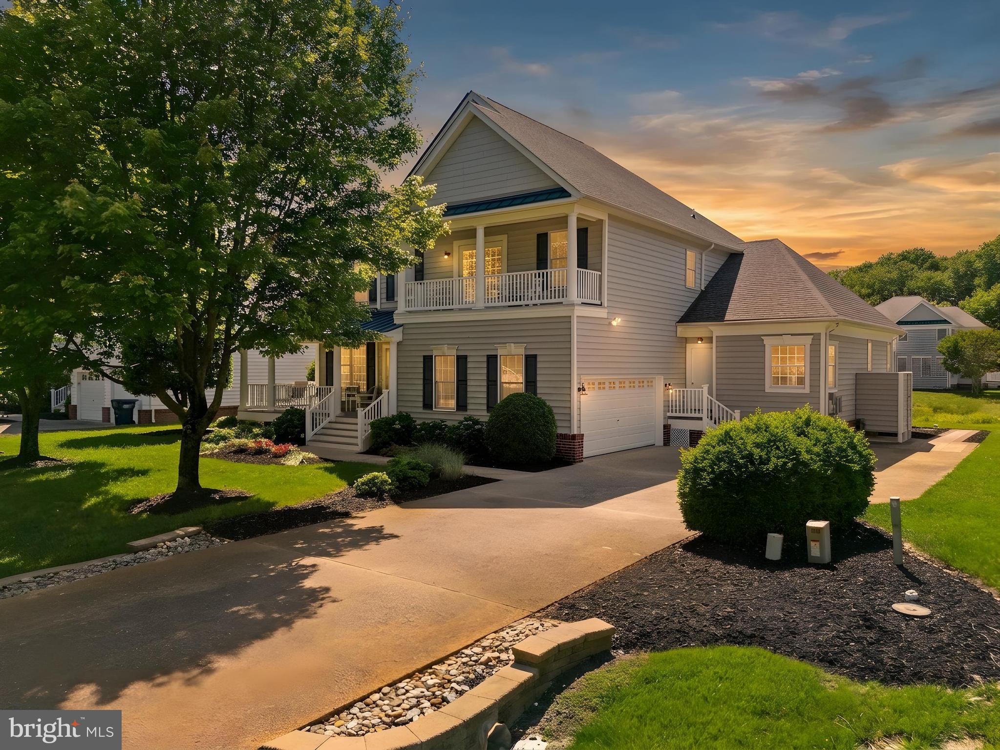 Welcome to one of the finest homes in the highly sought after gated community of Bethany Lakes, tucked away in the back of the neighborhood and offering a peaceful pond front setting just 1.5 miles from downtown Bethany Beach. This beautifully modernized Toll Brothers home combines luxury, comfort, and an exceptional coastal lifestyle. Overlooking picturesque water views, this stunning residence features 5 bedrooms and 3.5 bathrooms. Thoughtfully designed and meticulously maintained, the home offers an impressive layout with three separate living areas, creating the perfect balance of gathering spaces and private retreats. The main level showcases hardwood flooring, including hardwood stairs leading to the second floor, while the dramatic great room features soaring cathedral ceilings, and a fireplace surrounded by a walls of windows that fill the home with natural light. The beautifully remodeled kitchen is both stylish and functional, featuring quartz countertops, soft close cabinetry, pull out drawers, a pantry, ceramic tile backsplash, under cabinet lighting, high end appliances, a gas cooktop, wine refrigerator, garbage disposal, and a large center island with tranquil pond views. Designed for entertaining, the home offers a formal dining room, casual breakfast area, spacious sunroom, and multiple living spaces that flow seamlessly together. Step outside to the rear deck overlooking the pond, where beautifully landscaped grounds create an outdoor oasis. An outdoor shower adds convenience after a day at the beach. The first floor primary suite is a luxurious retreat featuring a tray ceiling, generous walk-in closet with built-ins, and a stunningly remodeled spa inspired bathroom. The updated bath offers extensive cabinetry, dual vanities, and a walk in shower with built in bench seating. Upstairs, you'll find a spacious loft area, a second primary suite with a private balcony, and three additional guest bedrooms. The guest bathrooms feature beautifully tiled tub and shower surrounds, providing both style and durability. Significant updates provide added peace of mind, including a new roof installed in 2021 and a professionally encapsulated crawl space completed in 2022. Owned solar panels help improve energy efficiency and reduce utility costs, while high end blinds and ceiling fans throughout enhance everyday comfort. Additional highlights include a side entry two car garage, a convenient main level powder room, and exceptional landscaping that creates outstanding curb appeal and complements the home's serene pond front setting. Bethany Lakes offers resort style amenities including a clubhouse, swimming pool with kiddie pool, tennis courts, playground, and multiple stocked ponds perfect for fishing. Conveniently located adjacent to Fresh Pond State Park and across from grocery shopping, restaurants, and everyday conveniences, this exceptional property offers the rare combination of luxury, privacy, and proximity to the beach. A truly stunning pond front home where thoughtful upgrades, timeless design, and an unbeatable location come together to create the ultimate coastal retreat.