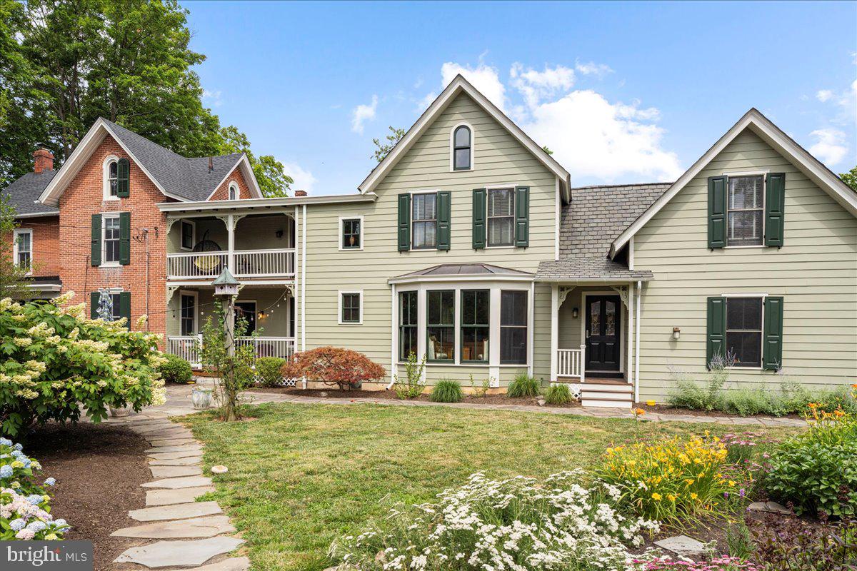 A Hidden Treasure in Doylestown Boro situated on an extremely private oversized lot!  This is the home you have been looking for... the charm of the old (circa 1881) and the convenience of the new (addition in 2009). Along with the beautifully restored living and dining rooms, you will find a spacious master suite, 3 additional bedrooms, 2 1/2 renovated baths, and an open gourmet kitchen and family room. Top of line appliances and custom cherry cabinets complete the kitchen. Enjoy the welcoming view of the outdoor gardens through the family room wall of windows. You will love entertaining in your private secret garden surrounded by colorful perennials. Other highlights include cherry hardwood floors, radiant heat, air conditioning, and a spacious 2 car garage. This home is Boro living at its best…steps away from the many restaurants, shops, and cultural activities offered in Doylestown.  All the hard work has been done for you - new roof, rebuilt front porch, freshly painted inside and out, just to name a few of the recent improvements. All this and Central Bucks schools! Welcome home!!!