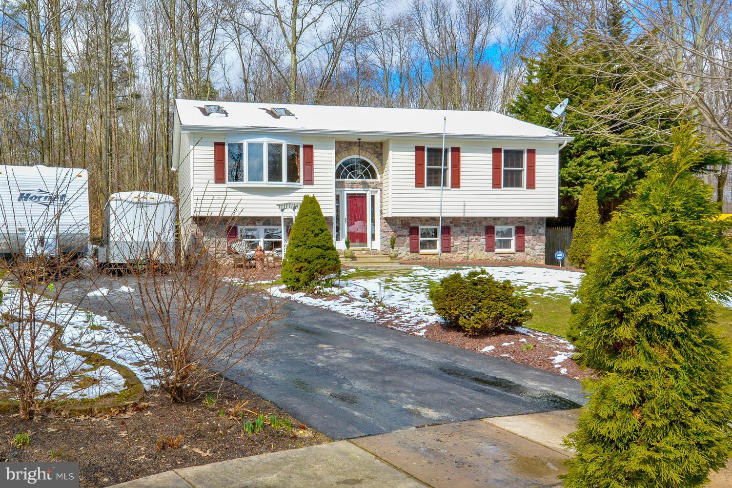 One of the largest homes in Northwoods backed to the woods at the end of a Court. Includes a pool, hot tub, large driveway, pellet stove, deck, pond, shed, greenhouse and a number of updates. Tons of privacy in fenced back. Vacant lot to the left that can not be developed. Pride in ownership shows. New flooring and carpet throughout. Vaulted ceilings, skylights, breakfast bar, and kitchen island.