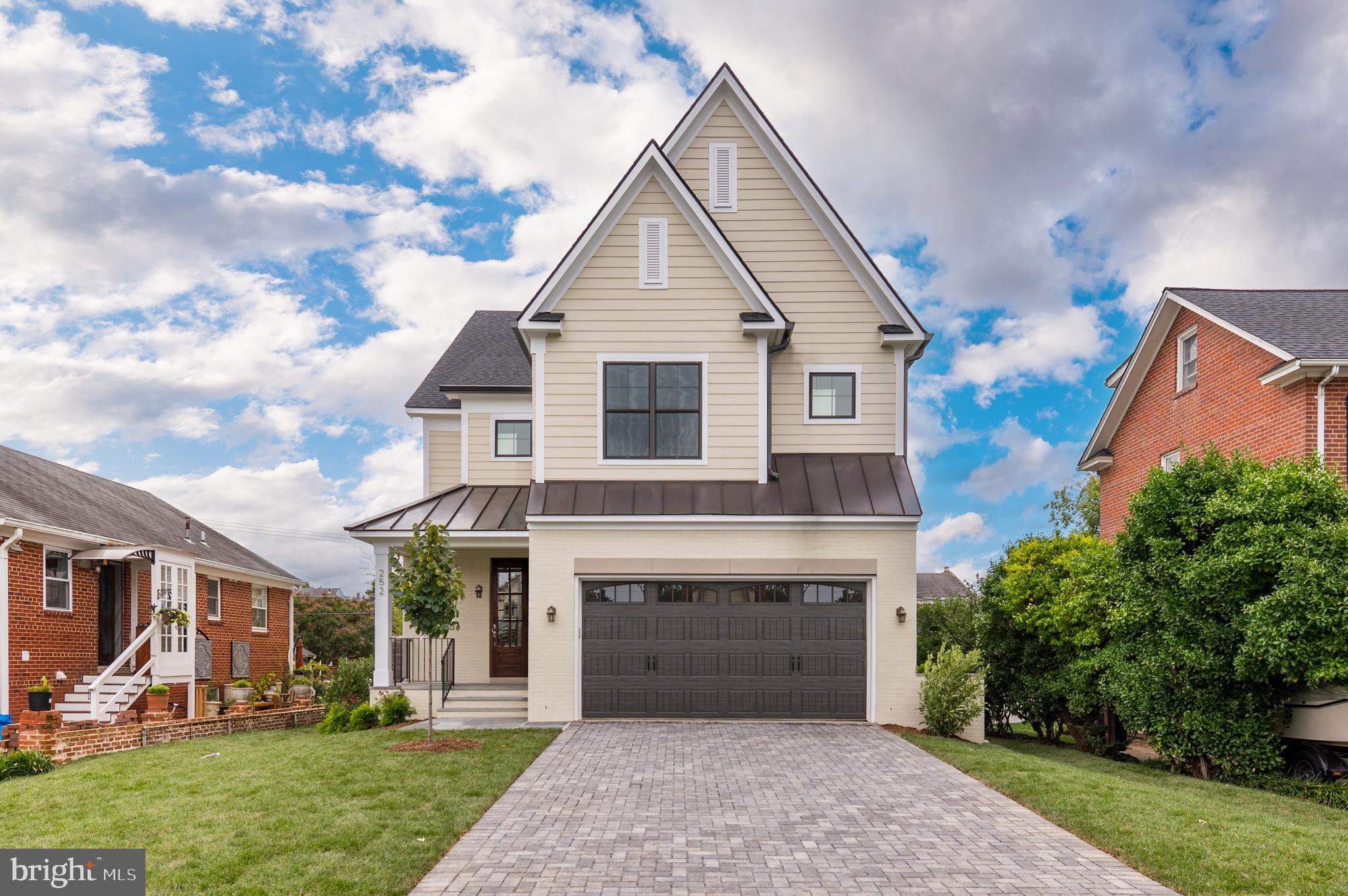 Stunning custom home by renowned 6th generation developer Wormald/American Signature Properties. Elevating new construction to new heights with high-end finishes, thoughtful design and floor plan, and an unmatched track record of construction in the Northern Virginia region - not to mention an industry leading warranty. This 4,538sf five-bedroom, four full bathroom and one half bathroom home includes a two-car garage! Set apart from other new construction homes, this attractive home features gorgeous brick front detailing and Hardie plank siding, and an inviting front porch. Gleaming hardwood floors will continue through the entire main level and shine in abundant natural light from large windows throughout the open concept floor plan. Main level will feature a gourmet chef’s kitchen complete with professional grade appliances, and a large island overlooking the great room. Great room is anchored around a gas fireplace and has sliding glass doors leading to the rear deck. Main level also includes a breakfast nook, food pantry, office/study, mudroom with cubbies, coat closet and a large formal dining room. Upper level boasts four large bedrooms, including an enviable owner’s retreat, complete with spa-inspired ensuite bathroom featuring double vanity, soaking tub, frameless glass shower enclosure and private water closet. Guest bedrooms are spacious, complete with walk-in closets and large windows. A secondary/princess suite features an en-suite private bathroom, and the third and fourth bedrooms share Jack/Jill style bathroom with private washroom setup. Bedroom level laundry and a large linen closet complete the upper level. Lower level includes a huge recreation room with a wet bar, perfect for entertaining. Additionally, the lower level has the fifth bedroom which is complete with the fourth full bathroom. Abundant storage space, utility and mechanical space, storage under the stairs, and a private office round out the lower level. Flat, grassy backyard and the entire home is professionally landscaped! Supreme location within the most convenient neighborhood throughout the entire D.M.V. – Zero stoplights to Washington D.C., close to Metro, schools, shopping, dining and grocery stores including Whole Foods. Easy access to the Pentagon, Amazon’s new National Landing HQ2 Headquarters, Virginia Tech Innovation Campus, proximity to I-395 and much more! CALL LISTING AGENT TODAY! (photos are of similar homes from same developer)