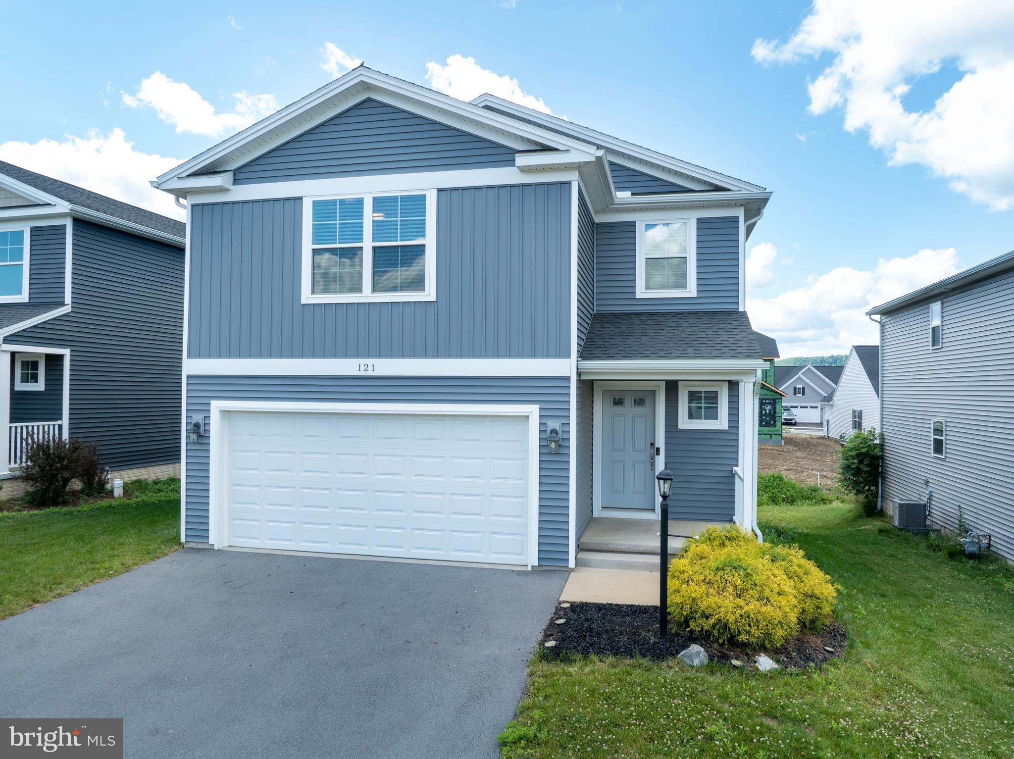 OPEN HOUSE - Thursday, June 25th , 4:30 - 6:00 PM
Welcome to 121 Caymus Drive, a nearly-new 4 bedroom home built in 2021. This home features an open concept living room, dining area and kitchen that allows you to stay connected to friends and family as you host get-togethers and share meals. The well-appointed kitchen is sure to impress with upgraded stainless steel appliances, stylish countertops and abundant cabinetry providing plenty of practicality. The laundry and mudroom create a functional transition between the living space and the attached two car garage. Upstairs, the primary suite shines with a huge walk-in closet and primary bath that includes a tiled shower and double-bowl vanity. The second bedroom also offers an en-suite bath adding convenience and comfort for guests and family. Two additional bedrooms, a full bath, and a versatile loft area complete the upper level, offering endless possibilities for a home office, reading nook, play space, hobby area or more! The walkout lower level expands the living space with a generously sized rec room and full bath which would make excellent guest quarters to an ideal place for entertaining. Outside, enjoy gorgeous sunsets or outdoor dining overlooking the backyard from the deck. This move-in ready property is moments to Penn State University and the shopping on North Atherton and is the perfect blend of comfort, style and location. Schedule your private showing today!