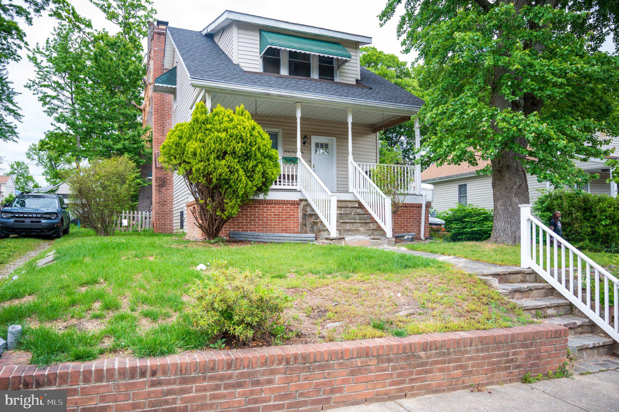 Nestled in a charming neighborhood, this delightful 1925 bungalow offers a perfect blend of character and modern comfort. With four bedrooms and three full bathrooms, this home is designed for both relaxation and entertaining. The fully finished basement, complete with windows and an outside entrance, provides ample space for a home office, playroom, or guest suite. The inviting living room features a cozy fireplace, perfect for gathering on chilly evenings. Outside offers plenty of room for outdoor activities and gardening. This community is known for its friendly atmosphere and convenient access to local parks, where you can enjoy leisurely strolls or picnics. With on-street and driveway parking, your guests will always feel welcome. Experience the warmth of this home and the vibrant community that surrounds it. Your new beginning awaits!