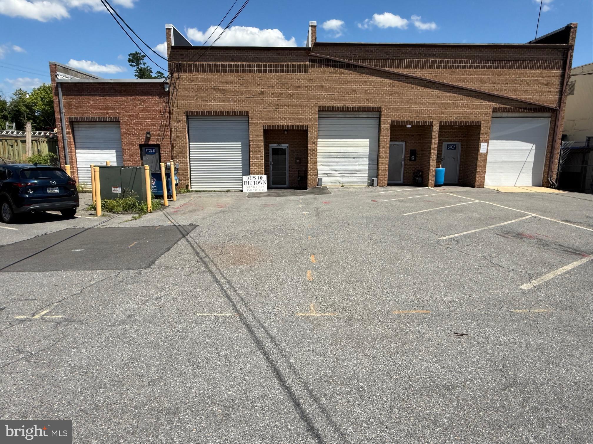 5707 and 5709 Arundel Ave.  Rockville -  4 bay warehouse building and parking lot for sale. Each bay measuring about 1,600 s.f. with high ceilings.  Total sq. ft. is 6,170 s.f.  3 bays are leased out and one will be delivered vacant for owner user or purchaser can lease out.  Each space has a garage door and 3' entry door and a rear exit door.  Located near the intersection of Twinbrook Parkway and Parklawn Drive.  Very convenient location in Rockville.