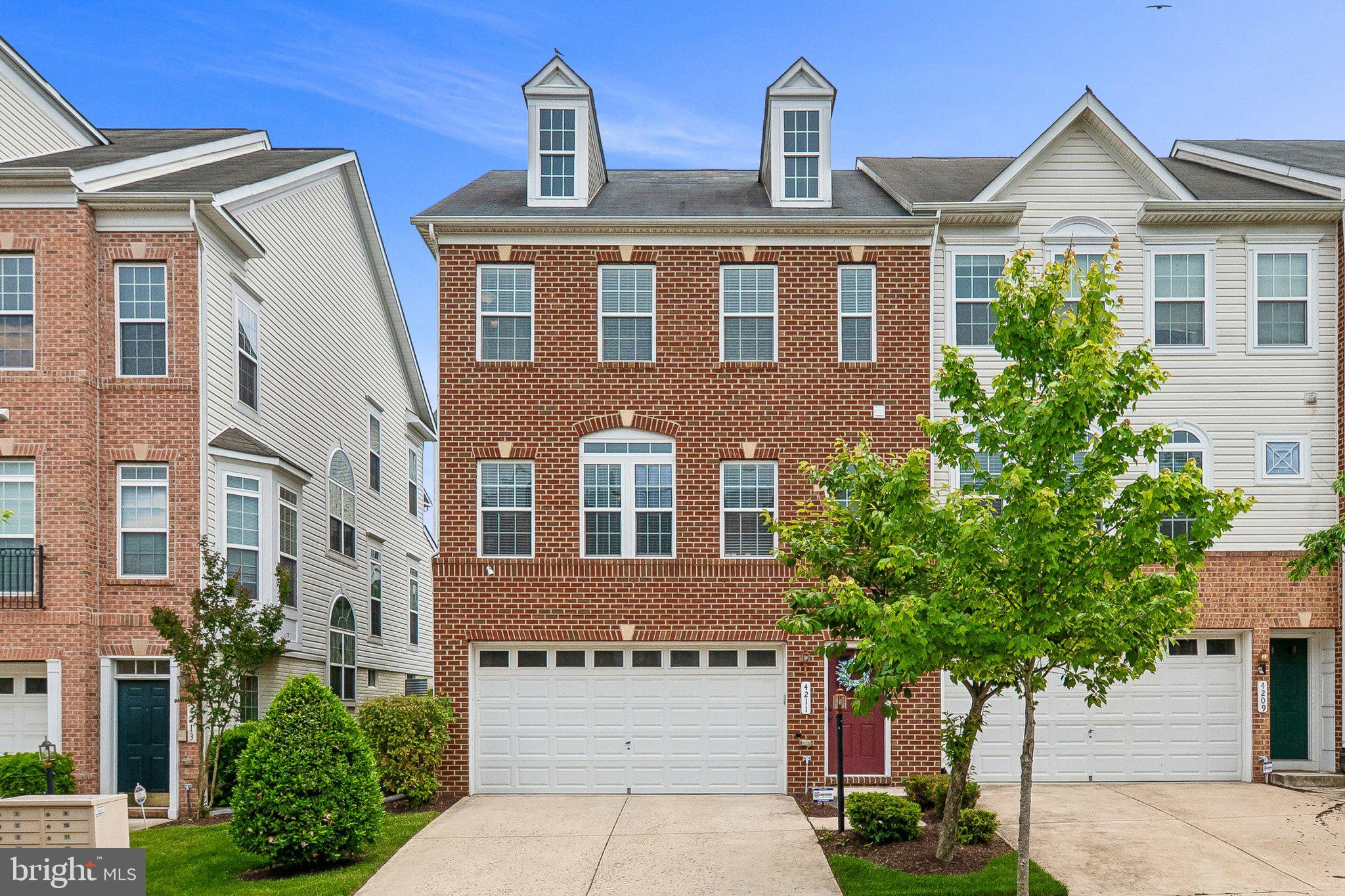 Nestled in the heart of the vibrant gated community of Town Center at Camp Springs, this charming end-of-row townhouse offers a perfect blend of comfort and community. This traditional-style home boasts 1,776 square feet of thoughtfully designed living space, featuring three spacious bedrooms, two full, and two half bathrooms, including a master bath with a separate jacuzzi soaking tub. The inviting layout is enhanced by a cozy fireplace, perfect for creating warm memories during chilly evenings. Step outside to discover the community's delightful amenities, including scenic fountain pond, well-maintained common grounds, and a jogging/walking path for you, your pets, and family to enjoy. With convenient walking distance access to the metro, a short commute to Andrews Air Force base and other government agencies, and close access to Washington, D.C., Northern Virginia, and the National Harbor, residents enjoy peace of mind knowing that everything they need is within reach. The association takes care of common area maintenance, lawn care, snow removal, dog waste bins and bags, and free library, allowing you to focus on what truly matters-making this house your home. The attached garage and driveway provide ample parking. Most of the appliances have been recently replaced, including AC and HVAC in 2025, washer and dryer in 2024, refrigerator in 2024, and microwave in 2023. Custom blinds, curtains, and TVs in the living room and master bedroom are included with the purchase of the house. 

Experience the warmth of the Fountain Blue community in this delightful townhouse, where every day feels like a retreat. Embrace the lifestyle you've always dreamed of in a neighborhood that truly feels like home.