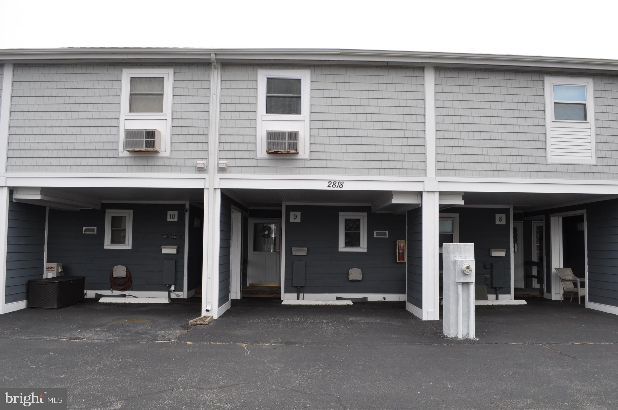 A little piece of heaven awaits you. Welcome to Old Port Cove West Community where location is everything. Visit this waterfront "Beach Retreat" which may be one of the Best-Kept Condo Complexes In Ocean City. This complex offers a wide canal close to the bay for convenient boating, New Wolf pvc Decking, Hardiplank Siding, Vinyl Railings and privacy side walls with a storage closet. A New Roof installed May 2022.  Also steps away from our salt water community pool. Within walking distance to area attractions including the world famous Ocean city Boardwalk, beach, amusement parks, restaurants and night life, mini golf and more!! This is a turn key condo that comes equipped with furnishings and appliances. Living Room looks out onto the canal and has a wood burning fireplace for those chilly evenings. Eat in kitchen with breakfast bar.  Large primary bedroom with vaulted ceiling and full bath, 2 closets and laundry on second level. This unit owner is the second owner from new build and never rented. Hot water heated 2018.