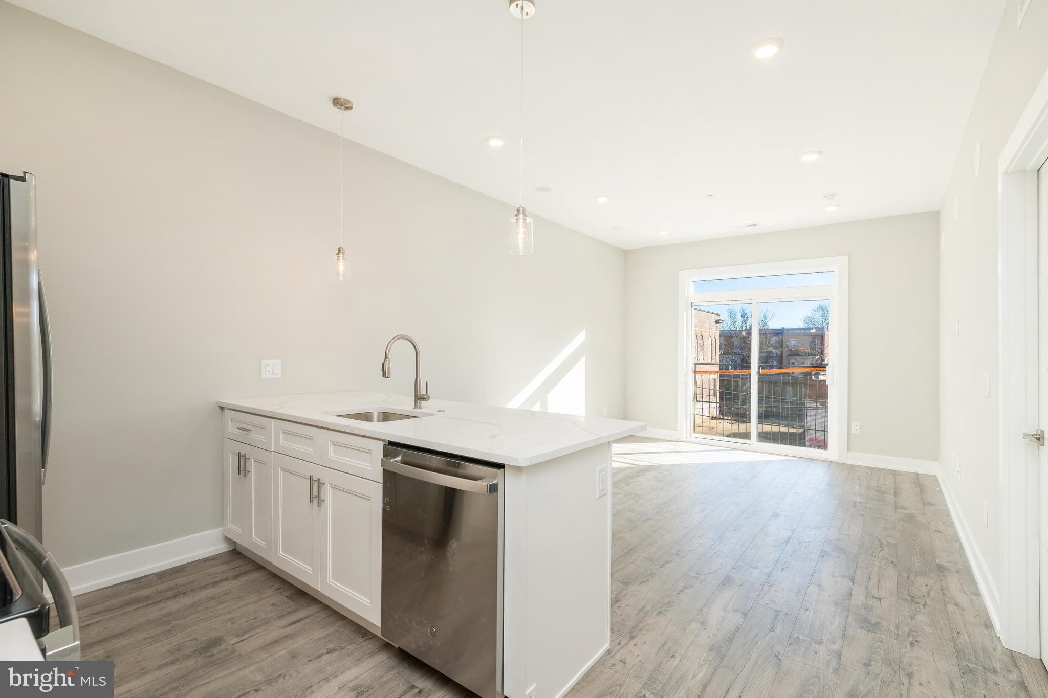TWO MONTHS FREE Rent on a 14 month lease if you apply by 2/29/24 and move in by 3/15/24.  Rent price reflects average rental price over a 14 month lease applying two months free on a $1,500 rental unit. Welcome to the Lofts at Henry Hall, a Viney House located at 2209-11 N Broad St, just minutes away from Temple’s campus and nestled in between all of the medical and educational facilities located in and around the North Broad St corridor.  This brand new construction building offers 21 residential units with three different bedroom layouts: one-bedroom, two-bedroom and three-bedroom units.  This spacious unit (Unit #303) features two bedrooms and two full bathrooms.  The Lofts at Henry Hall combines top amenities and values with spacious apartments that have a separate full bathrooms for each bedroom. Building amenities include:  24 Hour Building Security, Free wi-fi, Wireless Key Entry to Building & Apartments, Amazon & UPS Parcel Room for Secure Deliveries, Indoor Bike Storage, Surround Sound in unit audio, Elevator, In-Unit Washer & Dryer, Quartz Countertops, Convenient Septa Train and Bus Access, Rooftop Access to All Tenants with Shareable Sonos Sound System, Pre-wired television, New Construction 1st tenants, Separate Bathrooms, Stainless Steel Appliances, In-Unit Dishwasher, Under Cabinet Kitchen Cabinet Lighting, Upgraded Premium Laminate Flooring throughout units.  We are also walking distance to an incredible variety of shopping, dining, and entertainment! The neighborhood is home to delicious restaurants, cafes and pubs, as well as supermarkets, and movie theaters.  AMC Theater, Liacouras Center, The Met, RiteAid and CVS, Fresh Grocer, Five Guys, Starbucks and Dunkin Donuts, City View Pizza, Chipotle, Honey Grow, That’s only a small selection of the options that exist just a short trip from our community. Call us. Text us.  Visit us. To learn more about your life at The Lofts at Henry Hall and to schedule a tour.