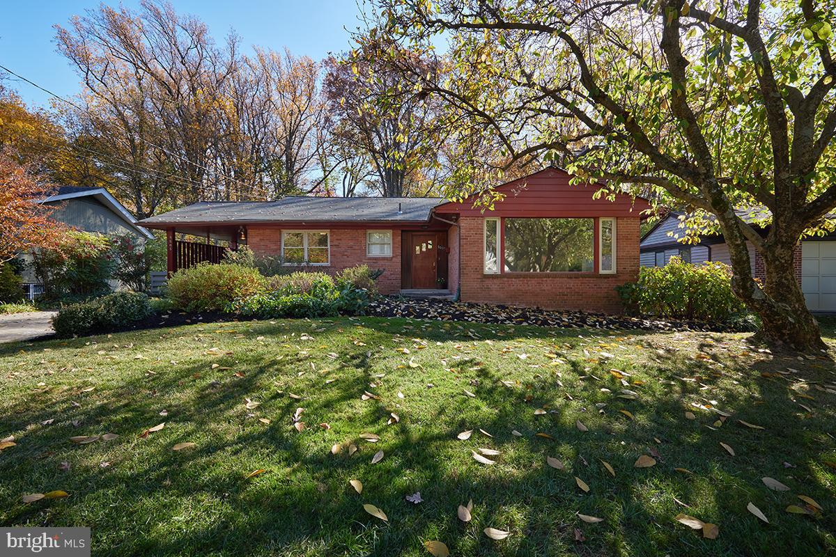 Welcome to this delightful mid-century residence backing to parkland in the Town of Somerset.  There are light-filled rooms, gleaming hardwood floors, comfortable living areas, and tasteful architectural details.  The main level offers a welcoming foyer, a sun-drenched living room with  fireplace and large picture window,  a  gracious dining room, and a table space kitchen with access to the picturesque patio.  The patio overlooks a lushly landscaped private fenced yard, colorful plantings, and Vinton Park.  What a fabulous setting for morning coffee or entertaining guests. while enjoying the bucolic views of a backyard paradise!  Completing the main level are three generously sized  bedrooms, two  baths and a carport with a side entrance. 

The  lower level features a  family room with a fireplace and a 1950's era bar, a bonus or exercise room, a workshop with ample storage space that was the setting for many a ping pong game, a sitting room and  laundry, a half bath, and an exterior entrance.  

This home’s superb location is close to all the amenities that the Town of Somerset has to offer—a community swimming pool, tennis courts, a batting cage, and basketball hoops. The award-winning Somerset Elementary School is nearby. The Fourth of July picnic, parties and dinners at the pool, and trick-or-treating on Halloween are popular Town traditions. Within walking distance are the jogging and biking trails of the Capital Crescent Trail, Norwood Park, Metro, Friendship Heights, and the shopping and dining scene in downtown Bethesda.