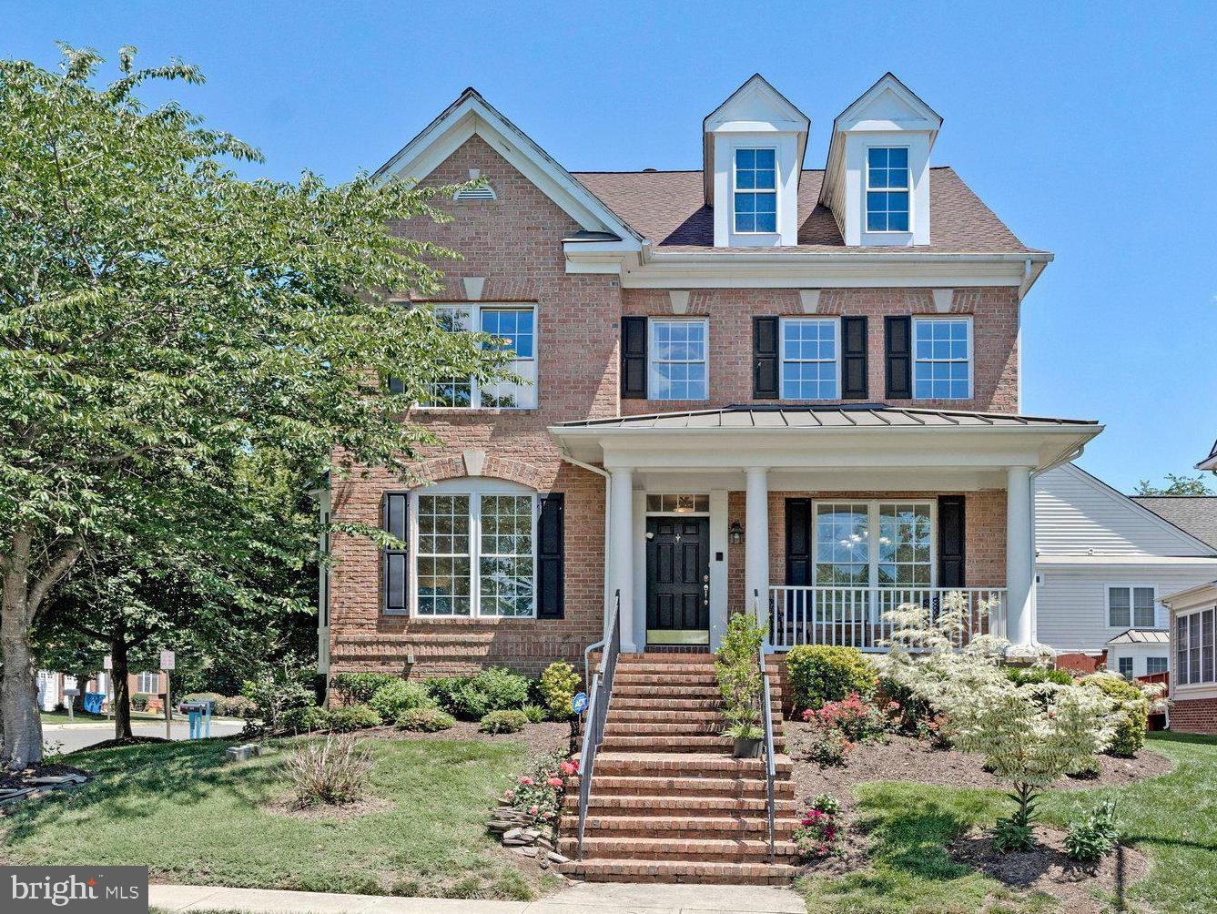 This exceptional 4 bedroom, 4.5-bath home has an estimated 4,225 Finished Square Feet of Living Space on a 6,365 Sq Ft corner lot.  Enjoy stress free living with a low maintenance property featuring lawn taken care of by the HOA, and the peace of mind of knowing that this freshly painted, Move In Ready, 2002 home has a New Roof and new HVAC units, all updated within the last 2 years.  
About a Mile from the shopping, restaurants and family activities of The Mosaic District, and the Dunn Loring-Merrifield Metro Station, this location is also super convenient. 

Entering the front door through the charming front porch, you are welcomed by a living room off to the left, and a dining room on the right.  Past these welcoming spaces, and continuing across these gleaming hardwood floors, is the vast main living space, with the kitchen featuring tall white custom cabinets, quartz countertops and island, stainless steel appliances, and breakfast room. This area is excellent for entertaining as it sprawls across most of the main floor.  Across the island, perfect for guests or children doing homework, is the sunlit family room with a gas fireplace and soaring ceilings with walls of windows.  Rounding out this floor is a sunroom which opens to the private, hardscaped and fenced in back patio perfect for al fresco dining and a morning coffee.  Past the pantry in the breakfast room is spacious 2 car garage. 

The upstairs features a large primary suite with two walk-in closets and a sitting room, a renovated full bathroom with an inviting soaking tub, frameless glass shower, and sinks on each side of this sunlit bathroom. There are also another 3 large bedrooms, 2 more full bathrooms, and one of this house’s laundry rooms.  

From the main floor and past the powder room and downstairs, one enters the huge lower level with its extra high ceilings.  This fully finished floor is built for entertaining and flexibility, offering a large recreation space, a room perfect as an office, a gym or for guests, storage, a full bathroom, a kitchenette, and the second washer and dryer.  Even this floor is fresh with paint, and brand-new luxury vinyl plank.  
Desirable corner lot, with a peaceful cul de sac, on one side, and ample parking on both streets. 
Open Sunday from 2-4PM.