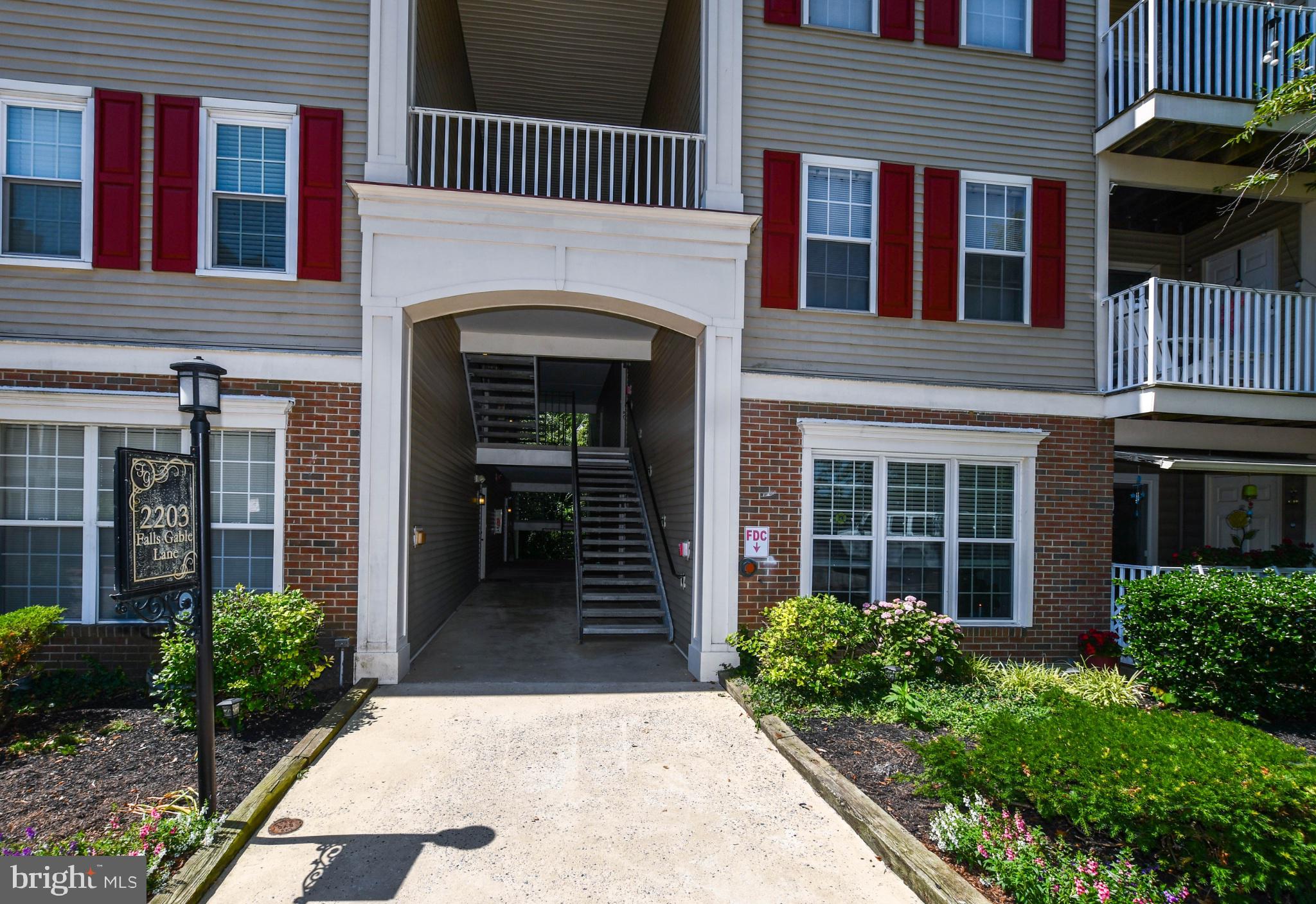 Discover this charming penthouse unit in the desirable Falls Gable community, offering a perfect blend of comfort and convenience. With 2 spacious bedrooms and 2 full bathrooms, this 1,430 sq. ft. residence features a well-designed layout that maximizes space and functionality. Including the loft area, which makes this particular condo unique amongst its neighbors. Step inside to find a welcoming entryway leading to a formal dining area and a cozy living space highlighted by a gas fireplace with glass doors, perfect for relaxation. The kitchen is equipped with modern appliances, including a built-in microwave, range, cooktop, dishwasher, and disposal, complemented by a convenient pantry for all your storage needs. Enjoy the luxury of hardwood and ceramic tile flooring, along with plush carpeting in the bedrooms. The master suite boasts a walk-in closet and a stall shower in the bathroom, ensuring both comfort and privacy. Additional features include ceiling fans and an entry-level bedroom for added convenience. Take advantage of the community amenities, including a refreshing outdoor pool, clubhouse, and beautifully maintained common grounds. Assigned parking and lighted, paved parking areas enhance accessibility. Situated slope-side with serene views of trees and woods, this property offers a tranquil retreat while being close to local attractions. Experience the ease of maintenance-free living with included services such as lawn care, snow removal, and trash collection. This penthouse unit is a perfect opportunity for those seeking a blend of comfort, community, and convenience.