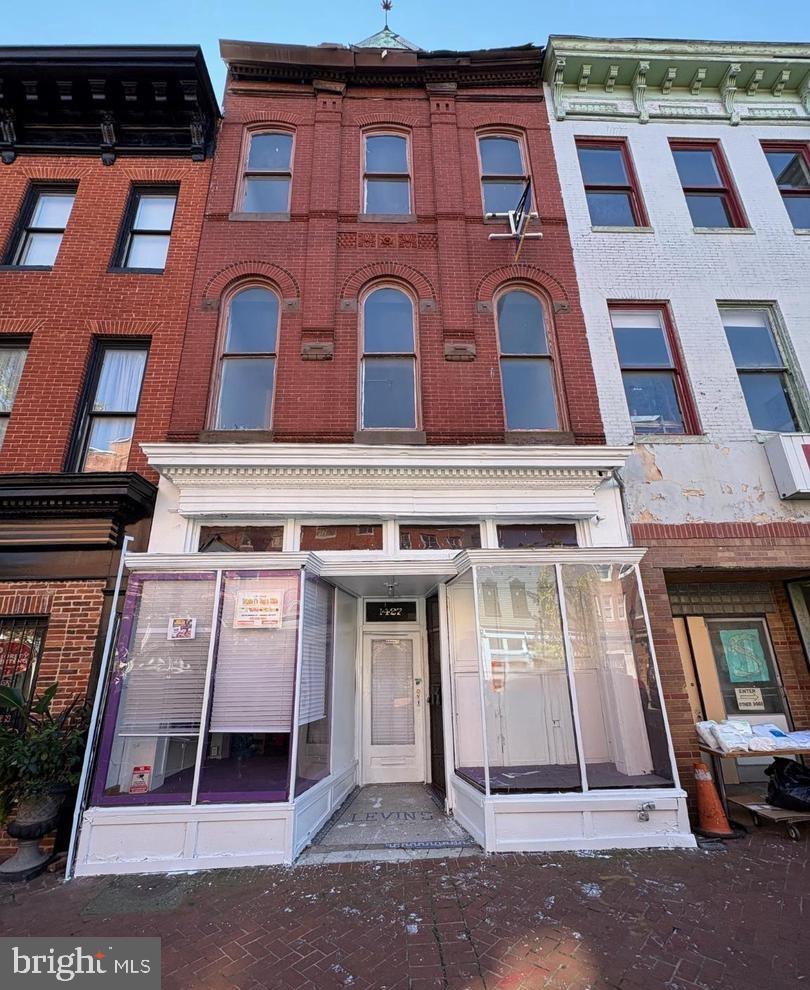 Discover a prime investment opportunity in the heart of UNION SQUARE!  This 3 unit contains a first floor/street level commercial space with two apartments above on the 2nd and 3rd floors. property is excellent for an owner occupant who wants to operate their business from the first floor storefront and live in one apartment upstairs and still obtain rental income from the 2nd apartment on the 3rd floor. The 2nd floor apartment has the potential to be 2 bedrooms.
For the investor the property offers great cash flow as it currently sits. Improve the property and see even greater returns with a potential rental income of $4500 or more per month!
Although in need of some TLC, this property is ripe for value-add renovations, allowing savvy investors to enhance its potential and maximize returns. Strategically located on a busy commercial block, and adjacent to both Union Square and Franklin Square residential areas. This property is  within walking distance to multiple transportation options, including bus stops and Light rail stations, making it highly attractive for renters seeking convenience. The detached garage offers additional storage and parking, a coveted feature in urban living. With small rear outdoor space, this property is easy to maintain while providing ample rental income potential. The surrounding area is vibrant and growing, promising a steady demand for rental units. Don't miss your chance to invest in a property that combines location, character, and opportunity for significant returns!