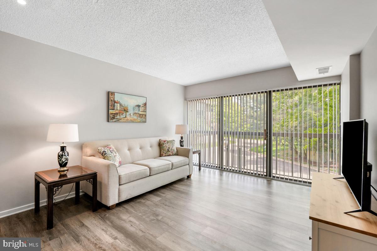 Spacious 1 BR plus den condo that is in fantastic condition! Beautiful newer kitchen with white cabinets, SS appliances and granite countertops! The kitchen opens to the spacious living room with LVP flooring, which in turn is adjacent to the dining room/den that has a full closet and could easily be converted to a 2nd bedroom. The baths are updated and include a powder room.  The apartment includes a washer & dryer and a large walk-in closet in the bedroom. All of this in Leisure World of MD, a 55+ active adult community that lives like a resort! Amenities include 2 clubhouses, 2 restaurants and a pub, a fitness center, golf course, pickleball courts, MedStar Health Center, indoor and outdoor pools, a library, billiards room, auditorium, art studio, 24-hour security and so much more! Come see what makes Leisure World so special, and why this home is a terrific value in today's market!