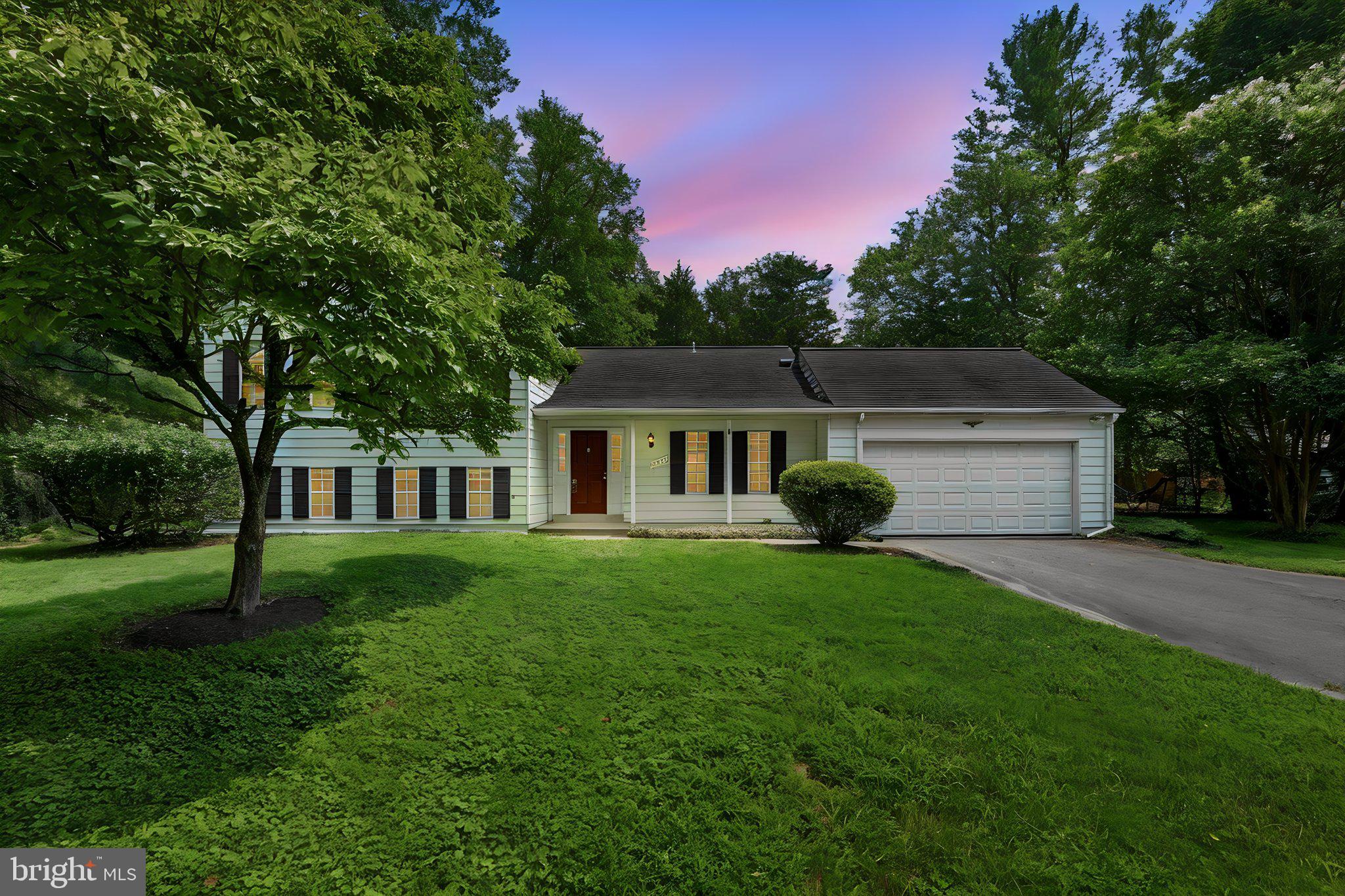 Welcome home to this sun-drenched, beautifully modernized 5-bedroom, 2.5-bath split-level retreat, nestled on a premier half-acre lot in Oakton’s highly coveted Vale Park West community. From the moment you arrive, mature landscaping and majestic trees wrap the property in natural privacy, while an effortless transition from the main living spaces to a gorgeous paved patio makes outdoor entertaining a breeze.

This residence is entirely turn-key. Updates include hardwood floors, plush new carpeting, contemporary lighting, and a fresh, neutral color palette throughout. At the heart of the home is an eat-in kitchen, fully equipped with premium stainless steel appliances and stylish ceramic tile flooring.

Unwind in the primary suite—a true sanctuary boasting a generous walk-in closet, and a refreshed en-suite bath complete with a bright skylight. The inviting lower level features a cozy family room anchored by a classic wood-burning fireplace, alongside a versatile fifth bedroom with an egress window and closet—ideal for a private home office, guest suite, or personal gym.  Two car garage with electric car charger and the oversized driveway provide tons of parking for family and guests.