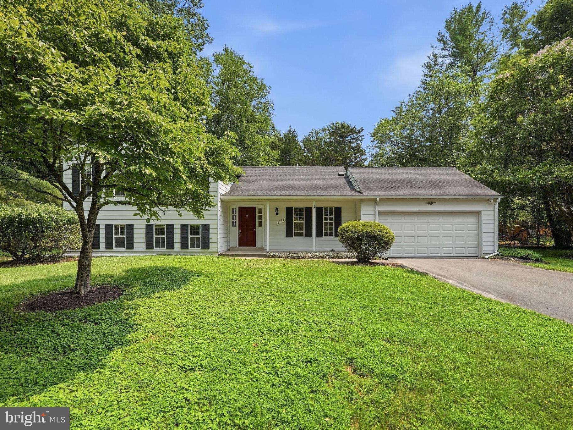 Welcome home to this sun-drenched, beautifully modernized 5-bedroom, 2.5-bath split-level retreat, nestled on a premier half-acre lot in Oakton’s highly coveted Vale Park West community. From the moment you arrive, mature landscaping and majestic trees wrap the property in natural privacy, while an effortless transition from the main living spaces to a gorgeous paved patio makes outdoor entertaining a breeze.

This residence is entirely turn-key. Updates include hardwood floors, plush new carpeting, contemporary lighting, and a fresh, neutral color palette throughout. At the heart of the home is an eat-in kitchen, fully equipped with premium stainless steel appliances and stylish ceramic tile flooring.

Unwind in the primary suite—a true sanctuary boasting a generous walk-in closet, and a refreshed en-suite bath complete with a bright skylight. The inviting lower level features a cozy family room anchored by a classic wood-burning fireplace, alongside a versatile fifth bedroom with an egress window and closet—ideal for a private home office, guest suite, or personal gym.  Two car garage with electric car charger and the oversized driveway provide tons of parking for family and guests.