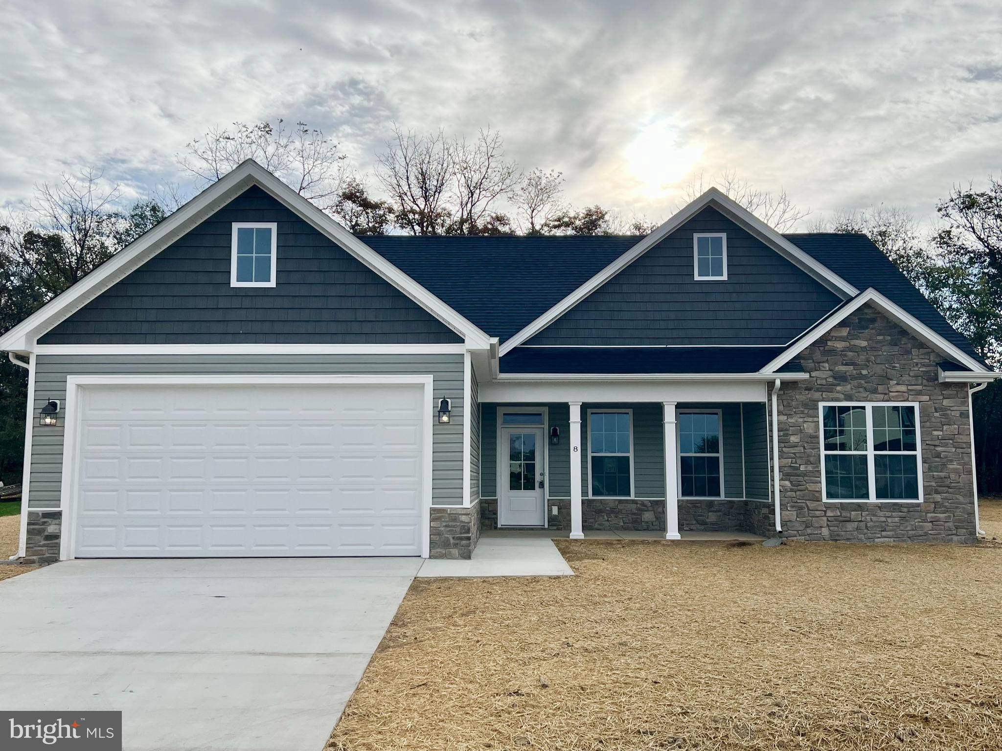 Permits are being submitted. New ranch home with 1712 sq ft of living area. Large primary bedroom with walk in closet, tiled shower with double headed shower heads. Family room with cathedral ceiling open to kitchen and dining area. Upgraded kitchen cabinets with Island, granite counter tops, stainless steel appliances, built in pantry cabinet. Enjoy the 14x16 Sunroom that leads to a concrete patio. LVP flooring in main living area and in Sunroom. Carpet in the bedrooms. Premium elevation with stone accent. Ceiling fans in family room and in primary bedroom. Builder offering $5,000 in closing costs!
