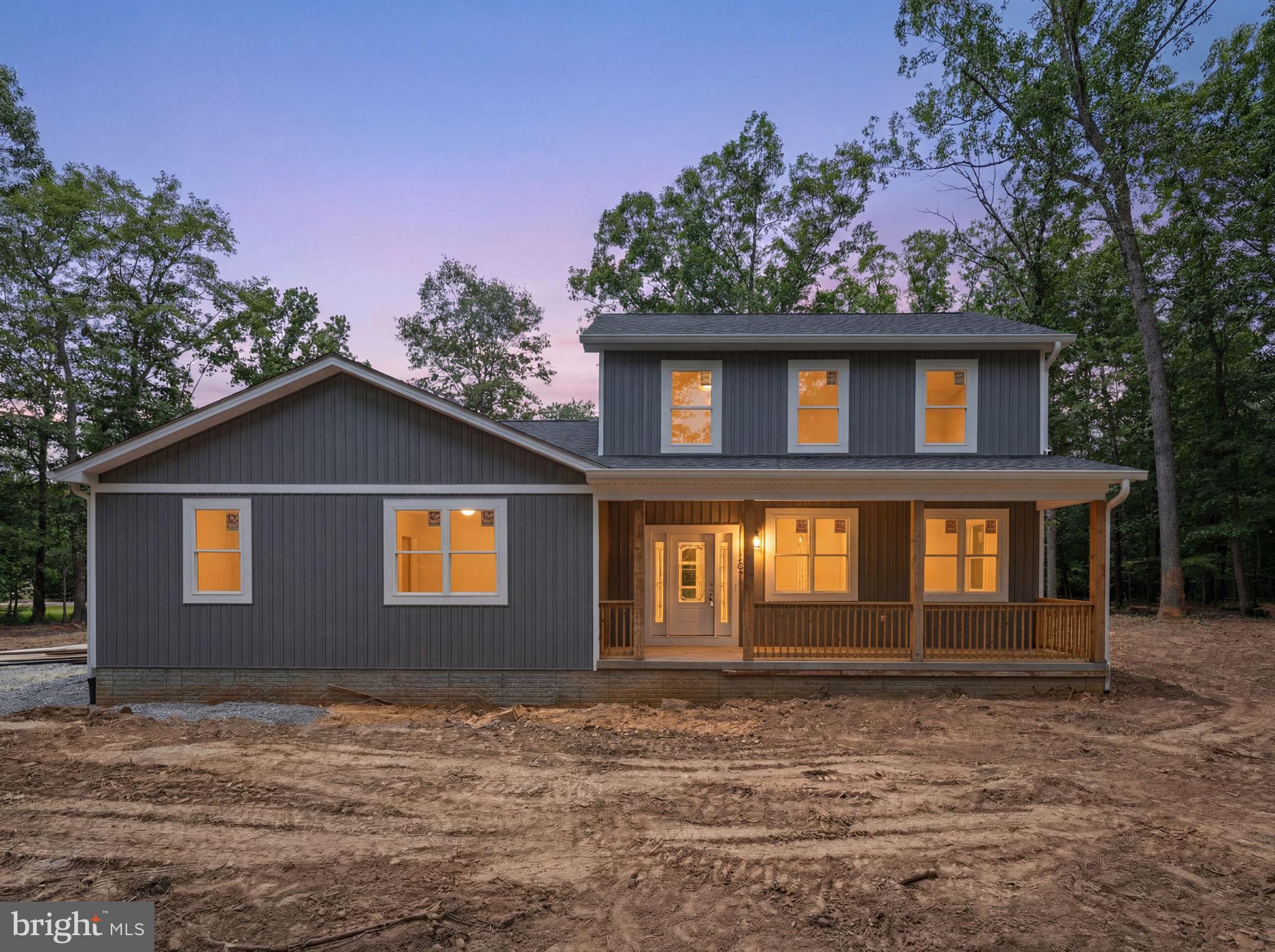 Situated on 2.55 acres, this newly constructed home combines modern finishes, a functional layout, and room to grow. Offering over 2,200 finished square feet, the thoughtfully designed floor plan features an open main living area, spacious kitchen, and a first-floor primary suite. Upstairs, additional bedrooms provide separation and flexibility, while quality finishes throughout create a clean, modern feel. The full unfinished basement offers significant potential for future living space, storage, recreation, or workshop use. Complete with a covered front porch and attached two-car garage, this property delivers the benefits of new construction along with the privacy and space that acreage provides. Conveniently located near Martinsburg, Hedgesville, and major commuter routes.