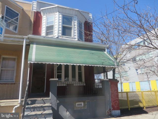 Two story, 3 bedroom, porch front, end of row home located in West Philadelphia just off of 59th and Market street. Living room, dining room and kitchen on the 1st floor. Three bedrooms, additional room and full bath on the 2nd floor. Property being sold strictly As Is.