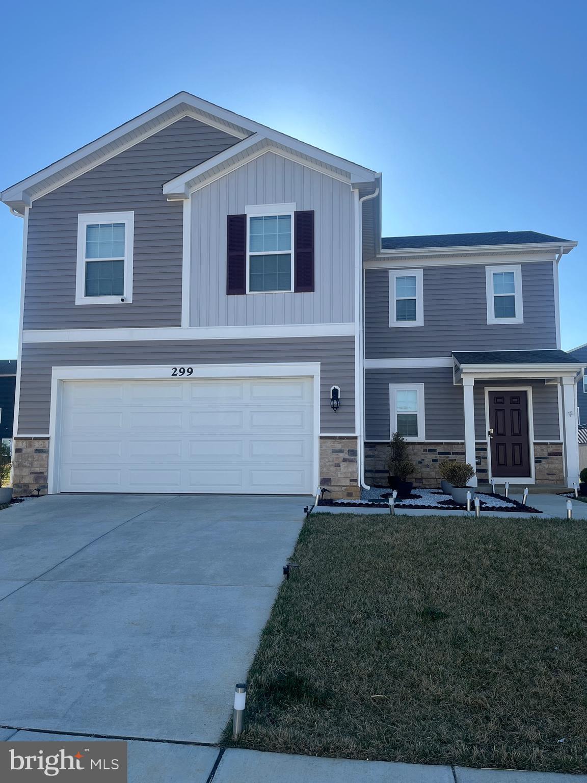 This beautiful, like-new, two-story Colonial-style home offers spacious living and modern conveniences. The first floor features a large living room, a half bath, and a dining area seamlessly connected to the kitchen—perfect for entertaining and family gatherings. Upstairs, you'll find four generously-sized bedrooms, including a large master suite (huge closet) with an ensuite bathroom for added privacy and comfort.  A second full bathroom caters to the other bedrooms and guests. The second floor also features laundry room and utility closet. The front loading  attached garage provides easy access to the home, and the nicely landscaped  lot offers a flat backyard.