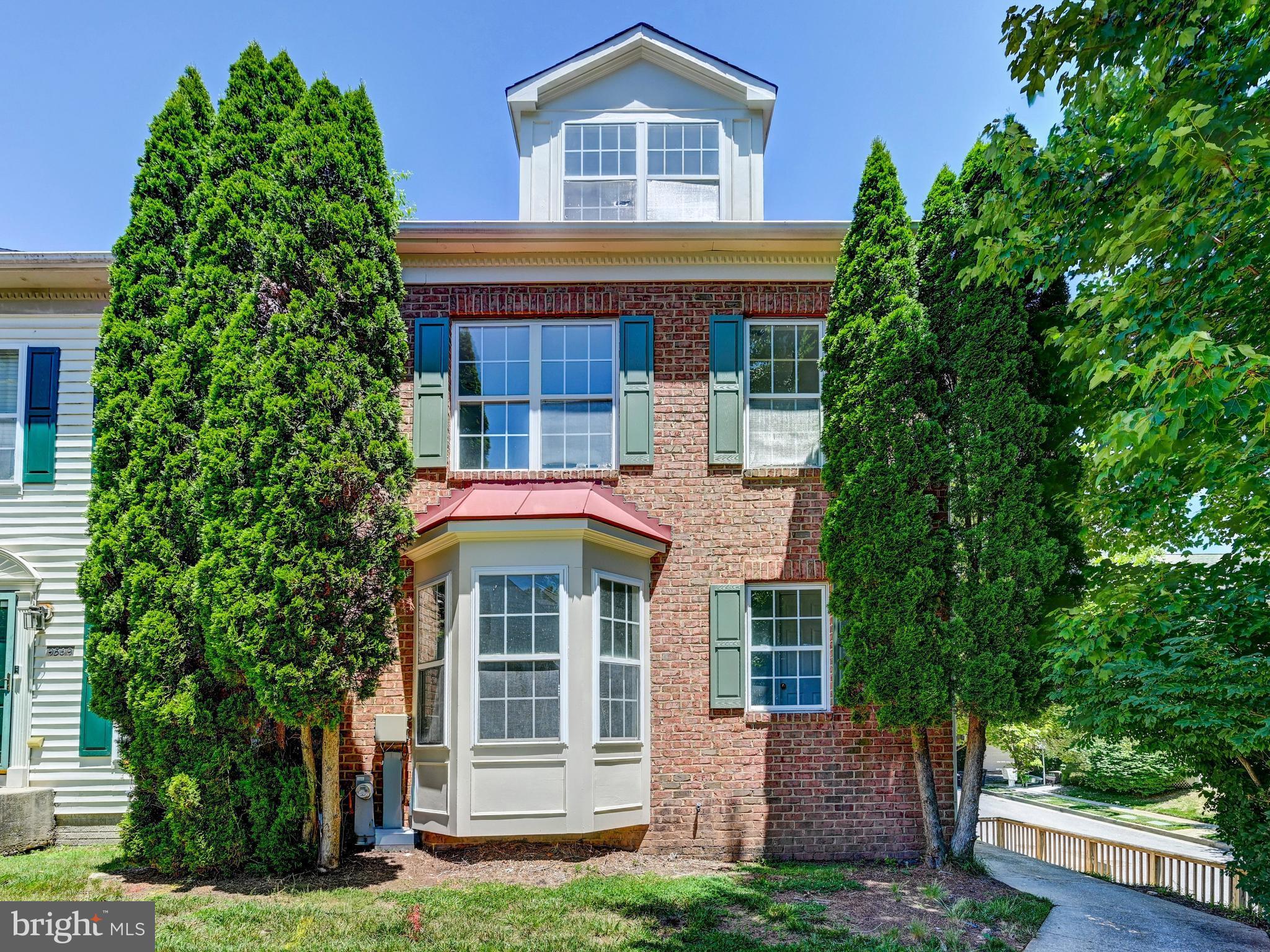 Warm, inviting, and beautifully renovated, this exceptional end-of-group townhome in Owings Mills' sought-after New Town community offers the perfect blend of modern updates and comfortable living. Thoughtfully designed for both everyday enjoyment and effortless entertaining, the home features three bedrooms, two-and-one-half baths, and a spacious two-car garage.

The heart of the home is the stunning renovated kitchen, showcasing timeless Shaker-style cabinetry, quartz countertops, an undermount sink, classic subway tile backsplash, and luxury vinyl plank flooring. White appliances, including a new range, microwave, refrigerator, and dishwasher, complete this bright and functional space.

Flowing seamlessly from the kitchen, the expansive living and dining area creates an ideal setting for gathering. A gas fireplace with marble surround and elegant mantel serves as a warm focal point, while recessed lighting, luxury vinyl plank flooring, and French doors leading to the rear deck enhance both style and functionality. Whether hosting a dinner party or enjoying a quiet evening at home, this space is designed to impress.

The upper levels provide a flexible and private retreat. The second floor offers two generously sized bedrooms, a full hall bath, and an oversized laundry room. Occupying the entire third level, the luxurious primary suite serves as a peaceful sanctuary, complete with a spacious sitting area, abundant closet space, and a spa-inspired garden bath featuring a soaking tub and separate shower.

The finished lower level expands the home's living space with a versatile recreation room ideal for movie nights, a home office, fitness area, or playroom, along with direct access to the two-car garage.

Extensive recent improvements include fresh paint throughout—including the garage—new front and rear decking, updated recessed lighting, and numerous additional enhancements. Combining stylish updates, generous living spaces, and a desirable end-unit location, this move-in-ready residence offers a lifestyle of comfort, convenience, and effortless entertaining.

Seller prefers use of RESE Title.