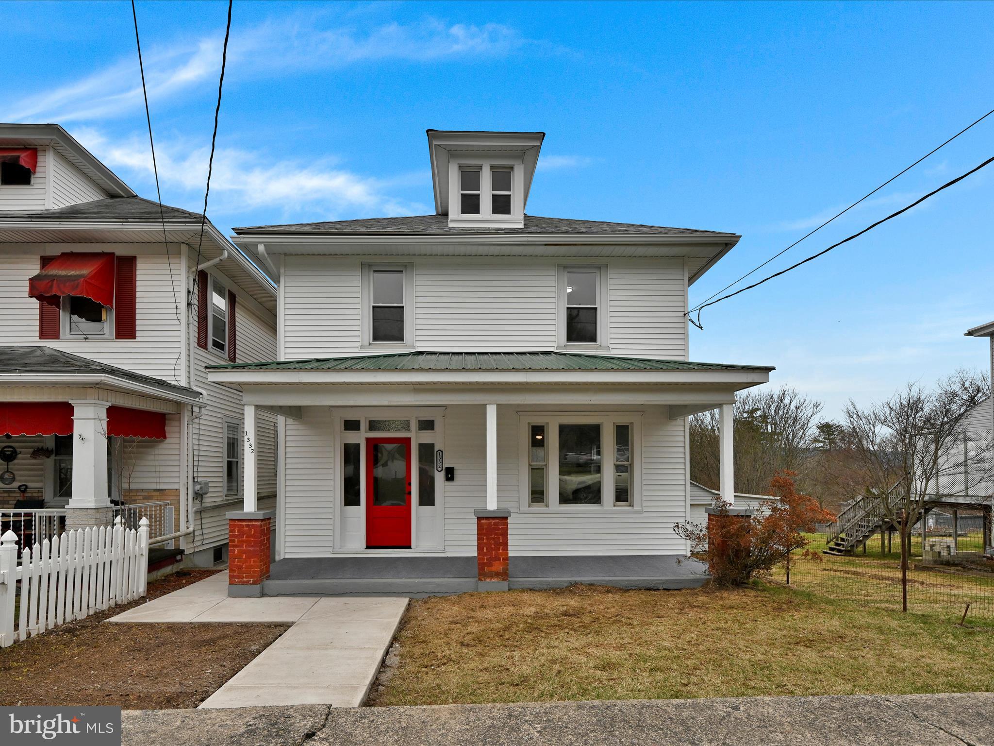 OFFER RECEIVED.  SELLERS REQUEST FINAL OFFERS BY 7 PM  SUNDAY APRIL 6TH  Beautifully renovated home is waiting for you.  The foyer area leads to the spacious living room with tons of natural light.  There is a separate dining room for your Holiday entertaining.    Nicely maintained natural woodwork throughout the first floor with built in cabinets along with all new wood laminate flooring.  Fully remodeled kitchen with plenty of cabinets.  New range and microwave.  The 2nd floor has 3 spacious bedrooms all with closets.  There is a 4th room that can be a bedroom, office, playroom etc.  There is a fully finished 3rd floor with heat for another bedroom area.  The roof is brand new and most of the windows have been replaced.   There is a large covered porch in the back that leads to a nice sized yard.  You also have the detached garage and off street parking in the back.  There isn't anything to do but move right in.  Join me for the Open Houses on April 4th and 6th or schedule your private showing starting Friday.