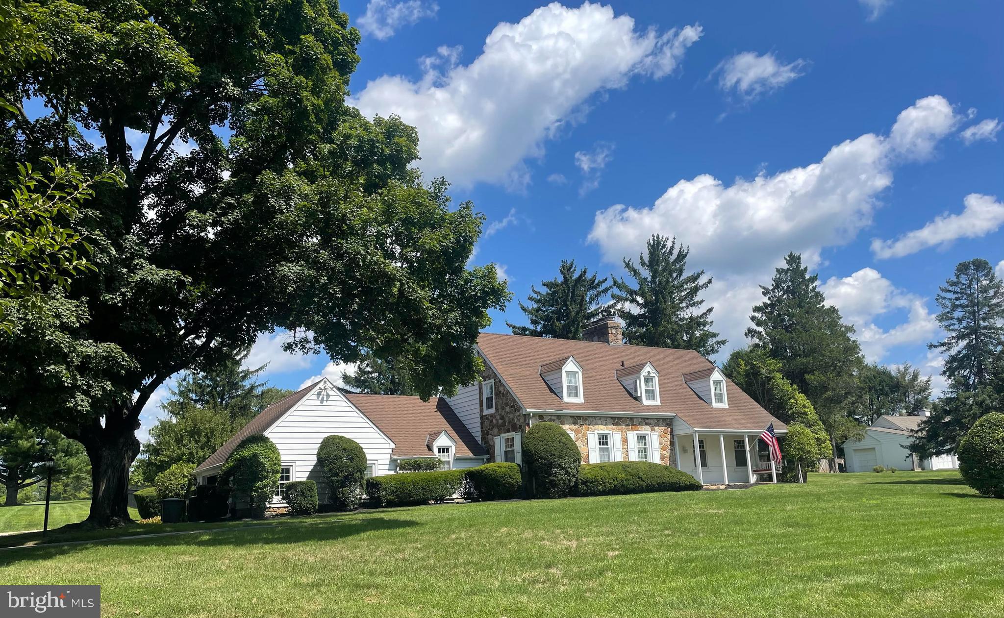 If living on one of the most prestigious golf courses in the country is something you have been dreaming of, then your dreams have come true. This home on Cricket Road, looks out on the 16th fairway of the Philadelphia Cricket Club, Wissahickon Course. The home sits atop a gentle hill with front of the home views of the pastures of Erdenheim Farm. Settle in to this lovely home situated on two and a quarter acre with a beautifully hardscaped, saltwater pool, a covered terrace, outdoor kitchen and a grand fireplace. The perfect spot to spend time in all seasons. Are you looking for a primary bedroom on the first floor? The primary bedroom is on the first floor, has cathedral ceilings, looks out to the pool and the golf course and has a primary bath with a steam shower and radiant floors. The kitchen has a breakfast area with a fireplace, built in shelving and French doors leading to the backyard oasis. There is a wine refrigerator, trash compactor, granite counters, a farmhouse sink, a combination of solid wood cabinets and others that are glass front and lit. Off the kitchen is the laundry room and a back entrance mudroom area from the garage. The living room has a fireplace, built-ins and floor to ceiling windows looking out on the terrace. The dining room is light and bright and affords views of the pasture. There is a powder room and an additional bedroom on the first floor. Upstairs are two large bedrooms with reading nooks under the eaves and good closet space. The lower level has a family room with a country size stone fireplace, a wet bar, a powder room and a room that is now used as a work out room. Off the lower level is an unfinished area with storage, room for a workshop and egress to the garage. Come see for yourself why your dreams will come true when you live in this home on the golf course and you can have a good seat to view the Truist Golf Tournament scheduled for May of 2025, featuring seventy of the top golfers on the tour.