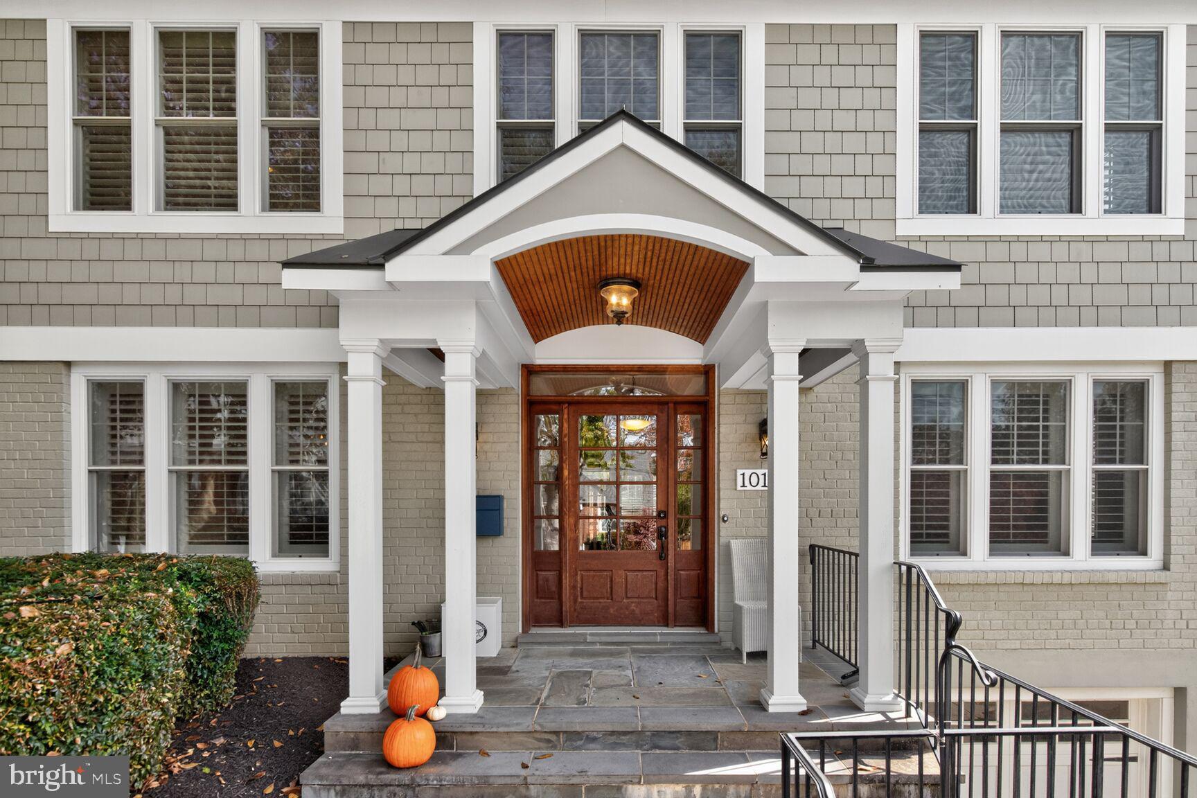 Located in the coveted Parkwood subdivision of Kensington, Maryland, this exceptional 6-bedroom, 4.5-bath residence exemplifies modern warmth, featuring masterful craftsmanship and thoughtful design,  featuring recent upgrades throughout. Enhanced with a newly updated gourmet kitchen, refreshed lighting, refinished lower-level flooring, and a beautifully improved owner’s suite bath, this home offers the sophistication of new construction — with the benefit of elevated designer improvements.

A welcoming covered front porch sets the tone for the elegance within. The main level showcases an open, airy layout with 9-foot ceilings, gleaming hardwood floors, custom designer lighting, and architectural millwork. The newly enhanced chef’s kitchen features stainless steel appliances, granite countertops, new statement lighting, and a breakfast bar overlooking an extraordinary light-filled, vaulted-ceiling breakfast room with walls of windows. This space flows effortlessly into the coffered-ceiling family room, anchored by a warm fireplace and opening to the backyard via French doors. A formal dining room with butler’s pantry, elegant living room, private study, and powder room complete this level.

The upper level is introduced by a stunning vaulted-ceiling gallery landing and continues with 9-foot ceilings, hardwood floors, and updated lighting throughout. The luxurious owner’s suite bath, newly refreshed, boasts a grand vaulted ceiling, expansive walk-in dressing room, and a spa-caliber bath with glass-enclosed shower, jetted soaking tub, and full-length dual vanities. Three additional bedrooms — including one with a private ensuite — along with a hall bath and bedroom-level laundry complete this floor.

The fully finished lower level, newly enhanced with refinished hardwood-style flooring and upgraded recessed lighting, includes a gym/library/office with French door entry, expansive recreation room with exterior access, fifth bedroom, full bath, and direct garage access.

Ideally situated just minutes from Grosvenor and Medical Center Metro, I-495, NIH, Rock Creek Park, and Kensington-Parkwood Elementary, this home offers the perfect fusion of upscale living, convenience, and community — in one of Kensington’s most sought-after neighborhoods.