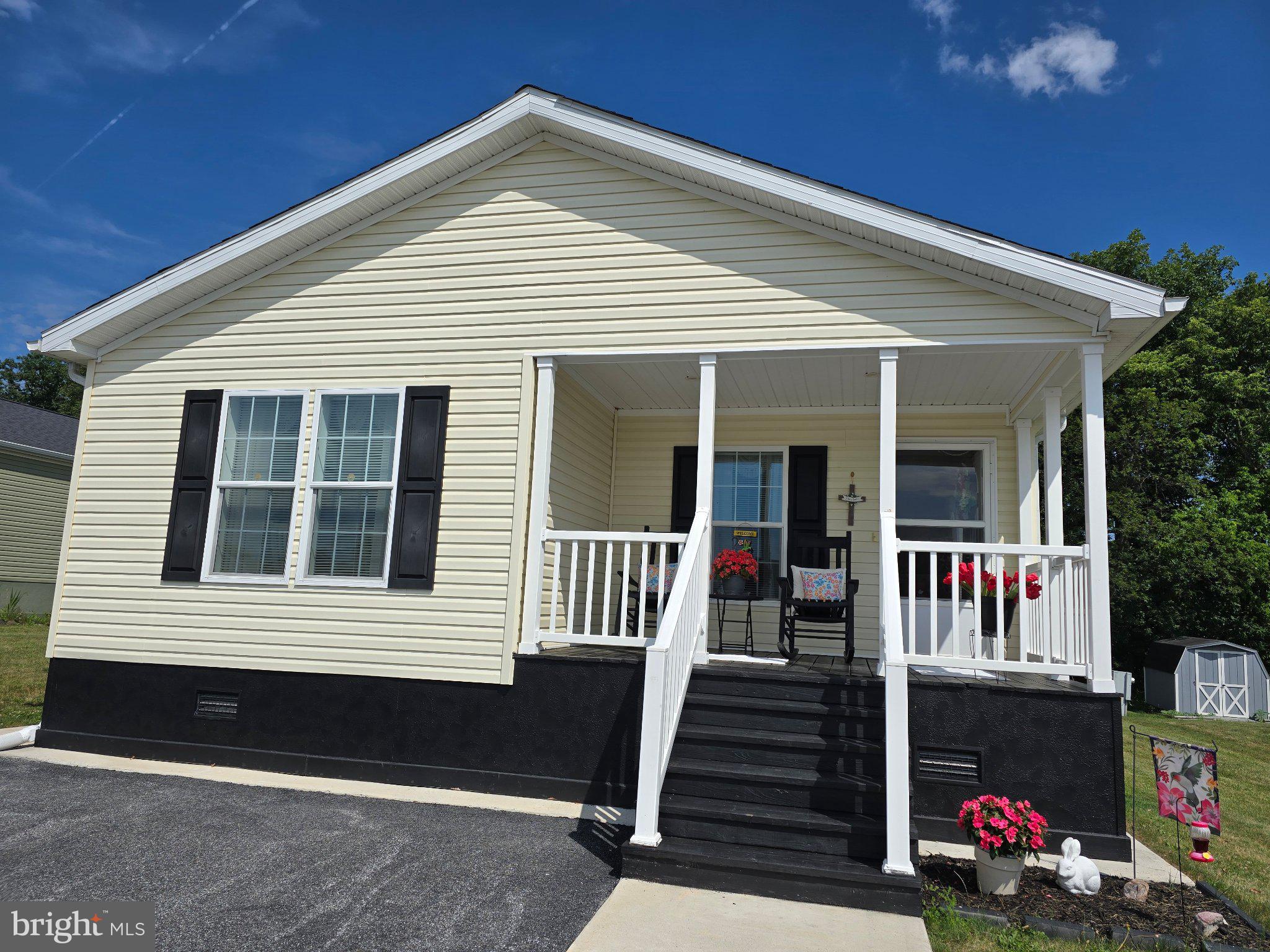 Nestled in the serene community of Pine Manor, this charming manufactured home offers a perfect blend of comfort and convenience for those seeking a peaceful lifestyle. Designed with a ranch-style layout, this residence features three spacious bedrooms and two full bathrooms, providing ample space for relaxation and entertaining. Built in 2019, the home boasts modern amenities and a thoughtful design that caters to your needs. The inviting living areas are bathed in natural light, creating a warm atmosphere that feels just like home. The well-appointed kitchen has updated cabinetry and is ready for your culinary adventures, while the open floor plan featuring newer flooring allows for seamless flow between spaces. Enjoy the ease of maintenance with durable vinyl siding and a manageable lot size, allowing you to spend more time enjoying the community and less time on upkeep. Home has 3 decks, large front, private rear deck and side entry decking. With a driveway that accommodates two vehicles, parking is a breeze. As a senior community with an age requirement of 55 and over, Pine Manor fosters a welcoming environment where neighbors become friends. Engage in community activities or simply relish the tranquility of your surroundings. This home is not just a place to live; it's a lifestyle choice that prioritizes comfort, community, and convenience. Experience the joy of living in a space designed for your needs, where every day feels like a retreat. Don't miss the opportunity to make this delightful residence your own!