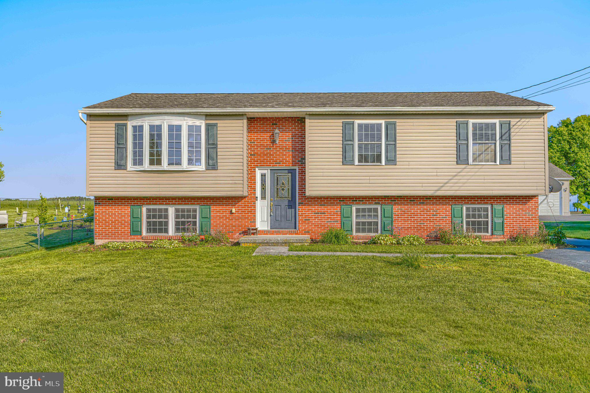 Nestled in the serene Lake Heritage subdivision, this charming split-level home offers a perfect blend of comfort and modern living. With four spacious bedrooms and three full bathrooms, this residence is designed to accommodate your lifestyle needs. The fully finished basement provides additional possible fifth bedroom or home office. The primary bath offers a tranquil retreat, ensuring relaxation after a long day. The brick exterior not only adds to its curb appeal but also shows durability and low maintenance. The well-appointed kitchen includes a dishwasher, making meal prep and cleanup a breeze. Set on a generous 0.36-acre lot, the property offers ample outdoor space for gardening, play, or simply enjoying the fresh air. The driveway provides convenient parking, ensuring easy access for you and your guests. This home is not just a place to live; it's a sanctuary where memories are made. Experience the warmth and comfort of Lake Heritage living, where every detail has been thoughtfully considered to meet your needs. Don't miss the opportunity to make this inviting residence your own!