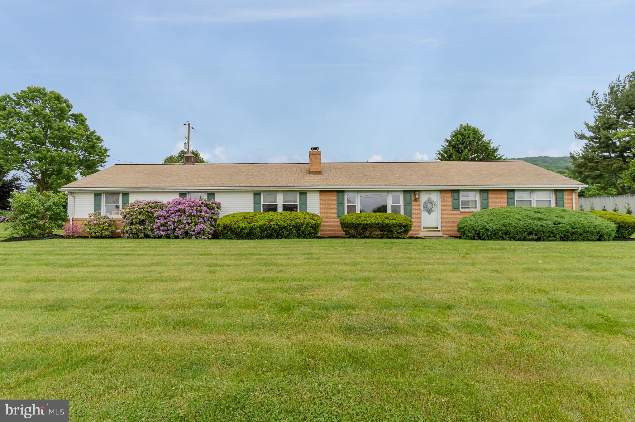 Come check this out this beautiful ranch style home with 1 level, 3 bedrooms, 2 bathrooms.  Large living Room shares a double sided brick fireplace with an additional living/family room space. The kitchen was just redone with white cabinetry, appliances, and granite counter tops.   Attached 2 car LL garage with side entry and spacious fenced backyard. If you're looking to find a home  that you can make into  what "you" want at a value price, call today and schedule your showing.