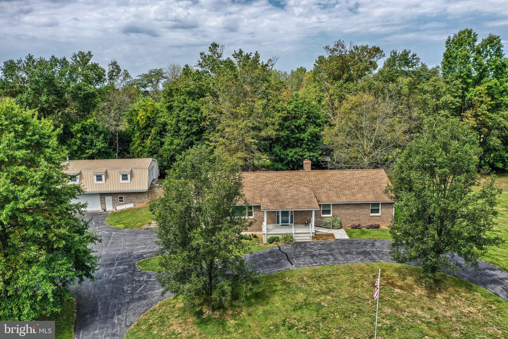 Take a look at this beautiful property in Conewago School District! This 3 Bedroom, 3 Full Bath home is ready for new owners. This Rancher home sits on 9.79 Acres. It boasts Hardwood Floors, a finished basement, 2 Attached Garage spaces, and 3 Detached Garage spaces, a private pond, and so much more! The current owner has some of the land rented to a farmer. There is a stream that runs through the property and it is a great spot for hunters. Schedule a showing today!