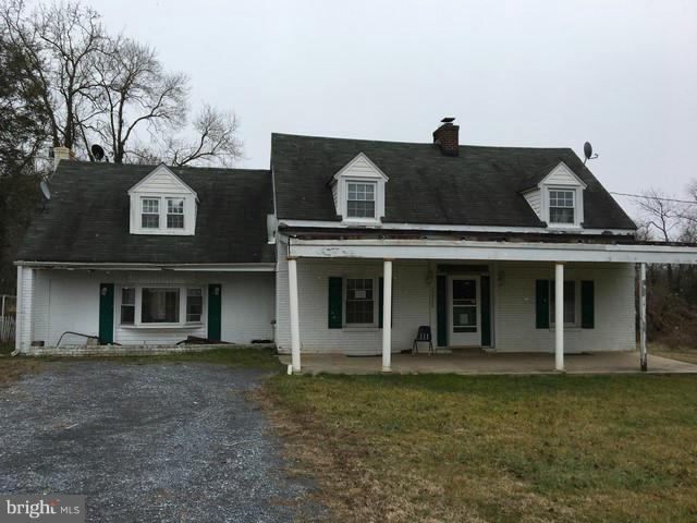 Just over 2 acres with endless possibilities. Nice lot with great potential!, property is being sold strictly as-is.Bring your CASH buyer and imagination.