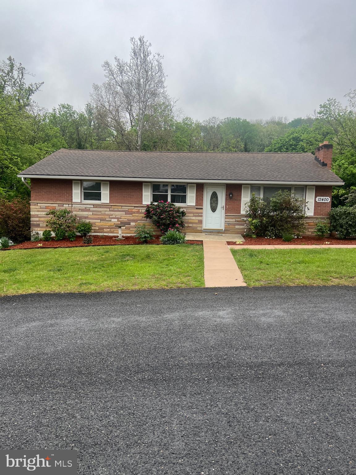 Dont miss this beauty!! 
This 3 bedroom well-loved home is nestled in the desirable comfortable community of LaVale.  With plenty of quiet yard and a peaceful stream.  The large deck off the kitchen and dining room overlook the mature trees and quiet backyard, a great spot for morning coffee or a dinner with friends.  The well lit modern kitchen/ dining room makes for enjoyable meal times.  Main floor bathroom and newly painted bedrooms make for easy access and the new laminate flooring make cleaning a breeze!!
Shopping, restaurants and highway access make this a very desirable home and property
