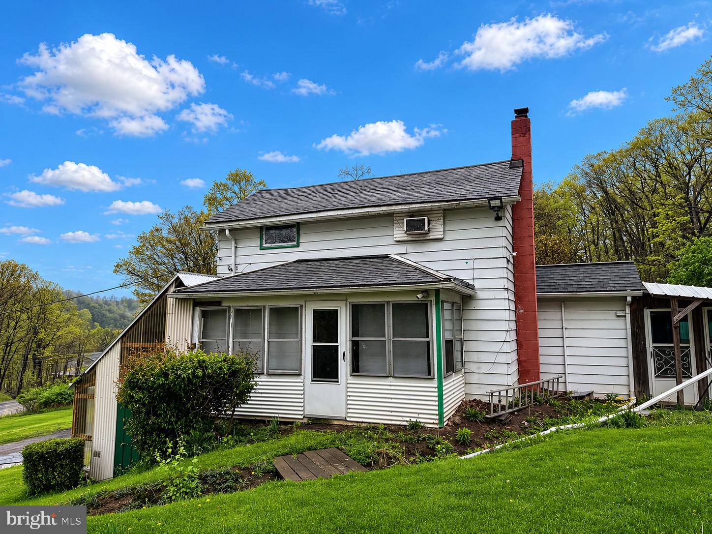 If you’ve been searching for a property you can truly make your own, this is it. This 3-bedroom, 1-bath home sits on a beautiful half-acre lot with woods on three sides, offering privacy and a quiet, natural backdrop. With a detached 2-car garage, carport, and convenient location, this home is full of potential for the right buyer ready to earn some sweat equity.