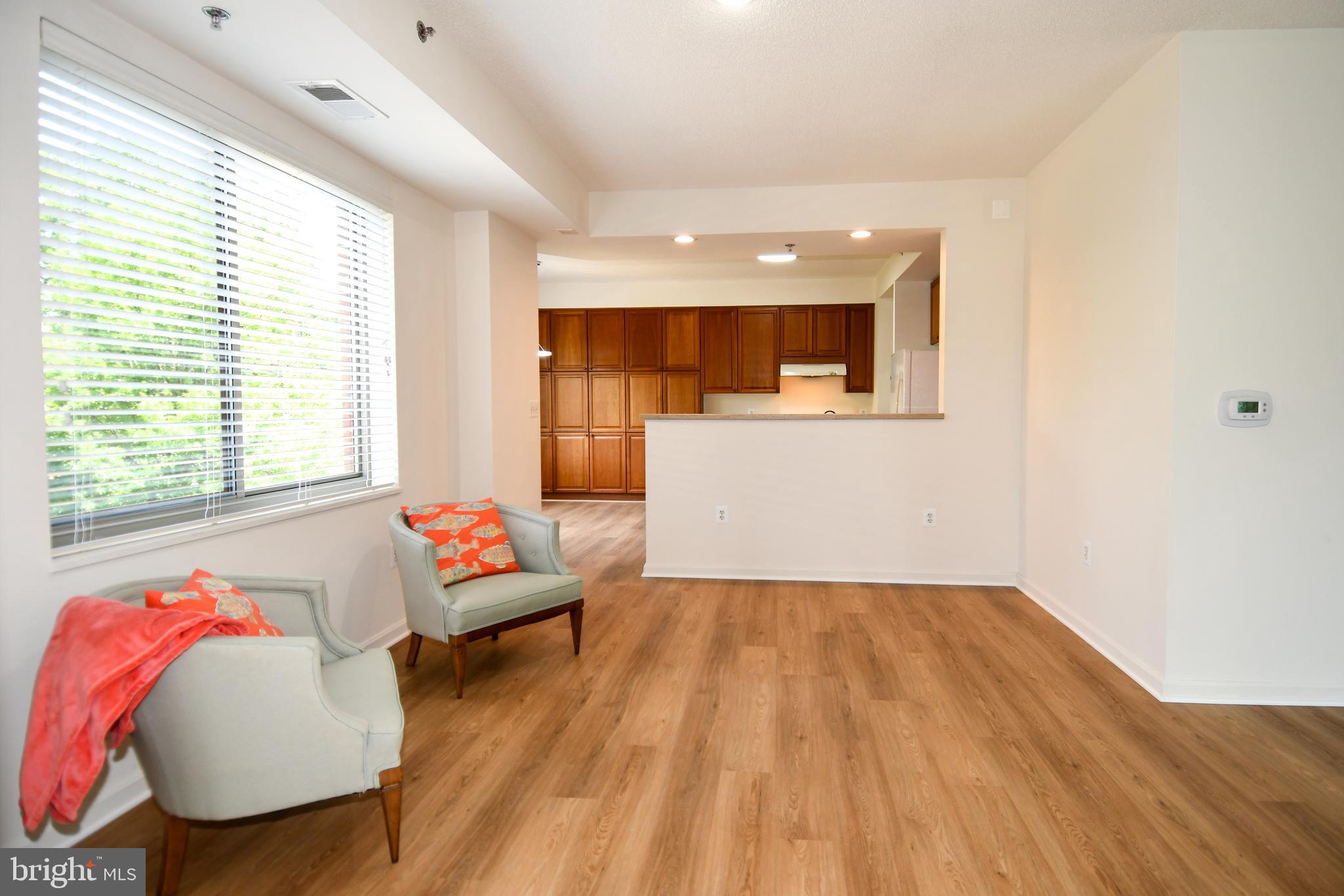 Finally, just what you have been looking for in The Overlook.  3 Bedrooms, 2.5 Full Baths, Large Kitchen, Garage Space #45.  This Spacious, 1735 sq ft  home has been recently updated with Luxury Vinyl Plank Flooring, New Lighting, Fresh Paint, New Valves throughout and New Faucets.  There is plenty of light all over the condo with lovely views.  This condo  has a separate laundry room and many closets.  It also includes a storage bin within the building for all your extra stuff!  New HVAC!
