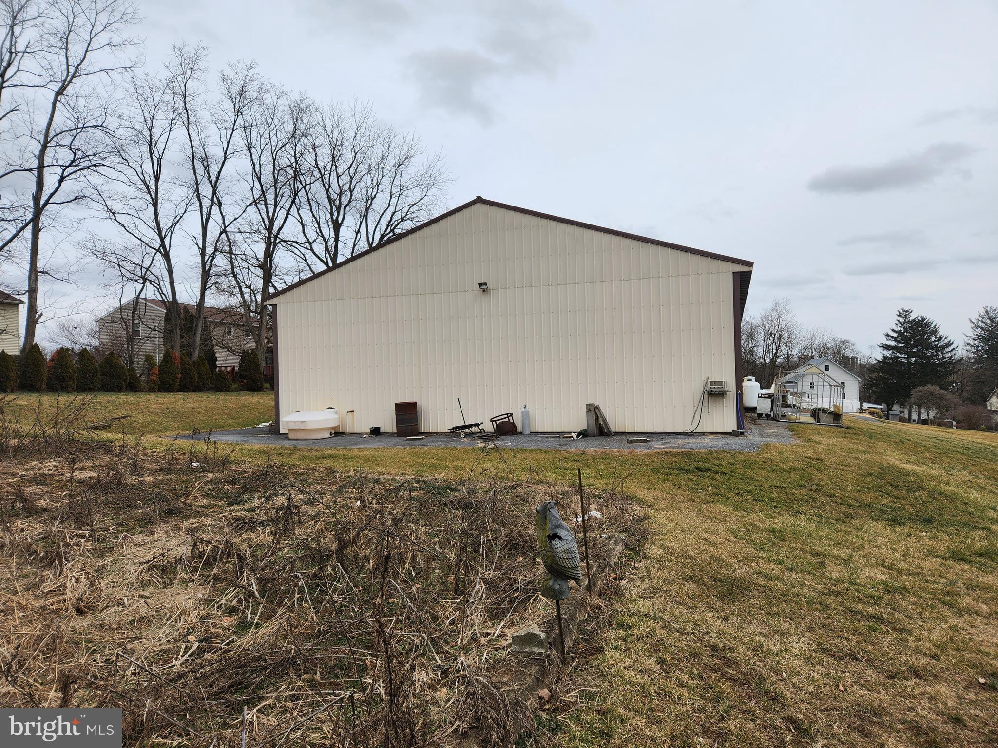 This property will be offered at Public Auction on Saturday, May 4th , 2024 @ 1pm or immediately following parcel 1.  The listing price is the opening bid only and in no way reflects the final sale price.  10% down due at auction, 2% transfer tax to be paid by the purchaser, real estate taxes prorated. There are 2 parcels being sold back to back.  Parcel 1:  Consists of 1.9 acre lot boasts a 40’x60’ shop with 12’x18’ doors and second-story storage. The lot also includes a 20’x40’ in-ground pool, bathhouse, and shaded concrete patio with fans. This property is approved for the building of a residential unit.