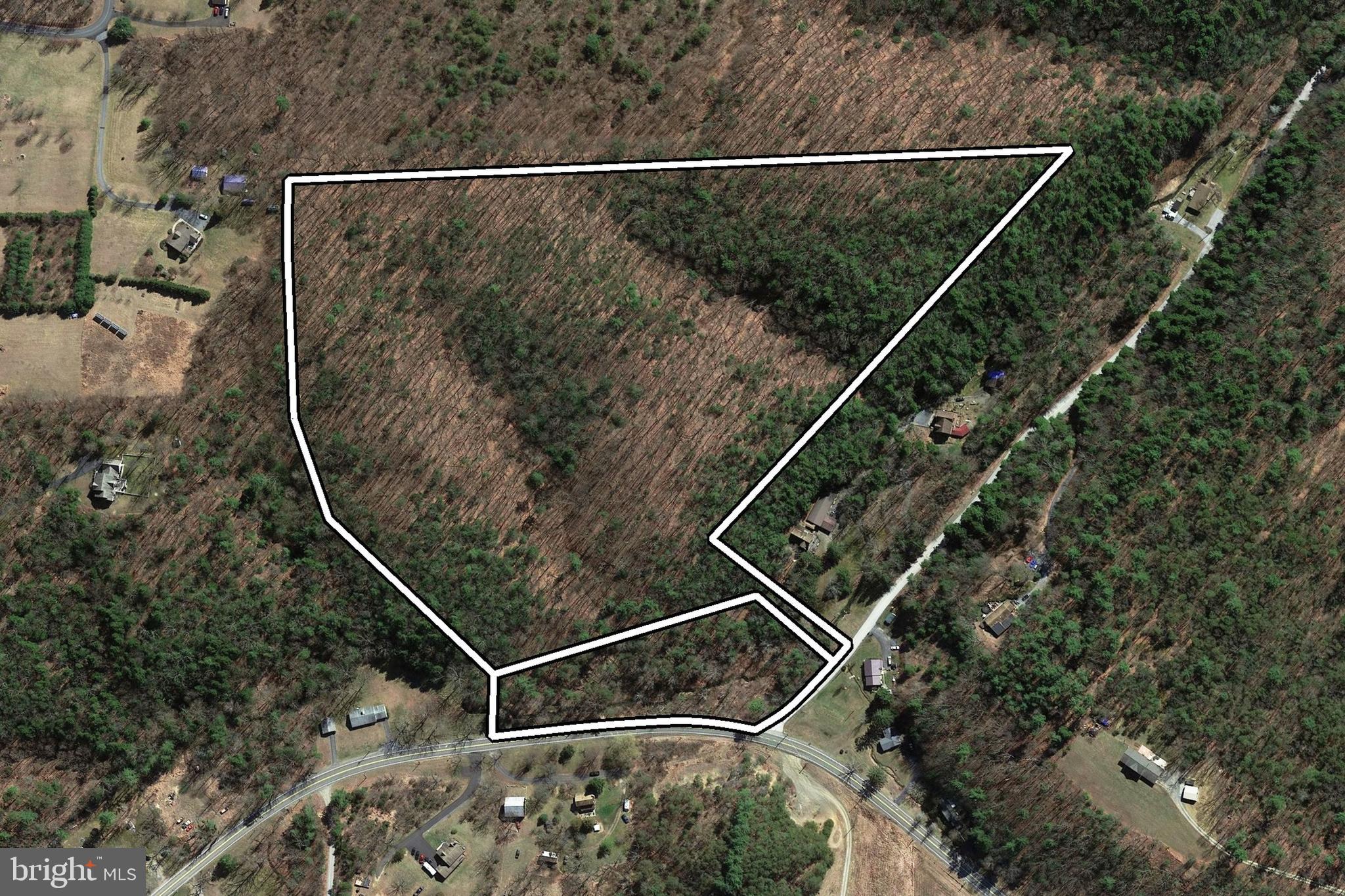 Welcome to a rare opportunity in the heart of Perry County featuring two connected parcels totaling approximately 28.5 +/- acres of untouched Pennsylvania countryside in peaceful Wheatland Township. Located along New Bloomfield Road, these parcels — one 25.5 +/- acres and the other 3.02 +/- acres — offer generous road frontage, a charming small stream near the base of the property, and endless potential for your dreams to take root. Step onto the land and immediately feel the serenity of nature all around you. This raw, vacant property is a true outdoorsman's paradise, home to thriving populations of whitetail deer, black bear, wild turkey, fox, raccoon, and other small game. Whether you're seeking your own private hunting retreat, a secluded spot for recreational adventures, or a place to build a future vision, this land offers the perfect setting. With no existing dwellings, well, septic, or utilities in place, the property offers a blank slate ready for your ideas, all while providing the beauty and tranquility of Pennsylvania’s rolling landscapes. Surrounded by natural beauty yet conveniently accessible, this is a special place where memories are made, traditions are started, and possibilities are endless. Come walk the land and experience for yourself what makes this property so special. Your piece of Perry County awaits!