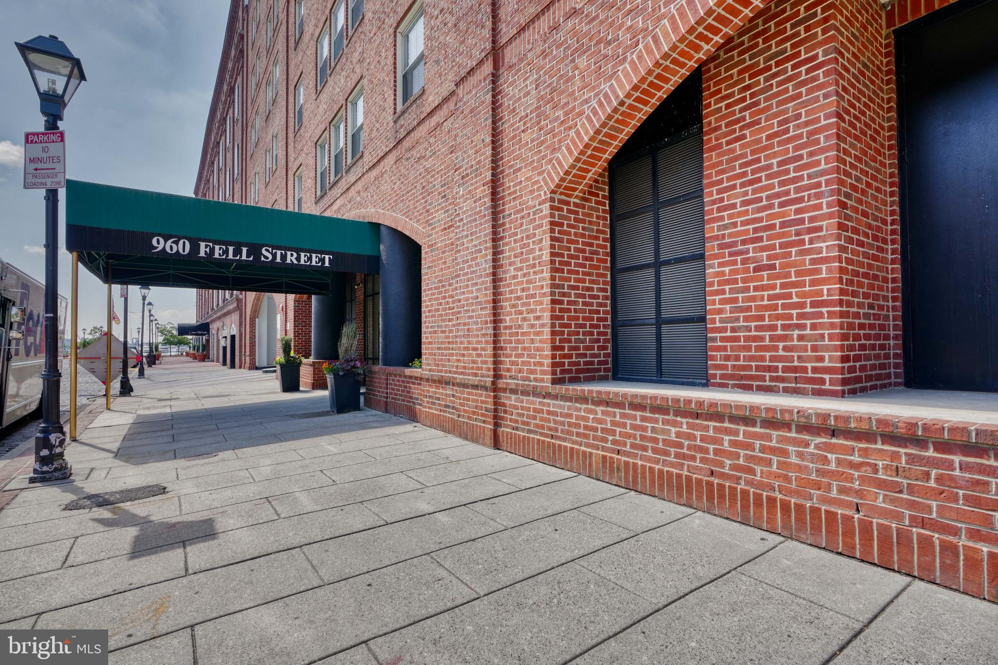 If you are seeking city living, consider this Belt's Landing  condo. It features an exercise room, an outdoor pool with a water view in the summer, a 24-hour front desk, and even a small library with pool table. This 2-bedroom, 2-bath condo has been freshly painted and showcases gleaming wood floors throughout,   with stainless steel appliances and granite counters, and TWO CAR PARKING. The primary suite boasts a walk-in closet, a private bath with a separate shower and tub, and a double sink vanity. The second bath is perfect for guests, family or an opportunity for roommates as well. Local shops, restaurants, and nightlife are at your beckon call with this convenient Fells Point location. There is so much here to see and experience, you should schedule your showing today.
Minimum 680 Credit Score required. Pets are case by case basis. Landlord prefers a multi-year lease.