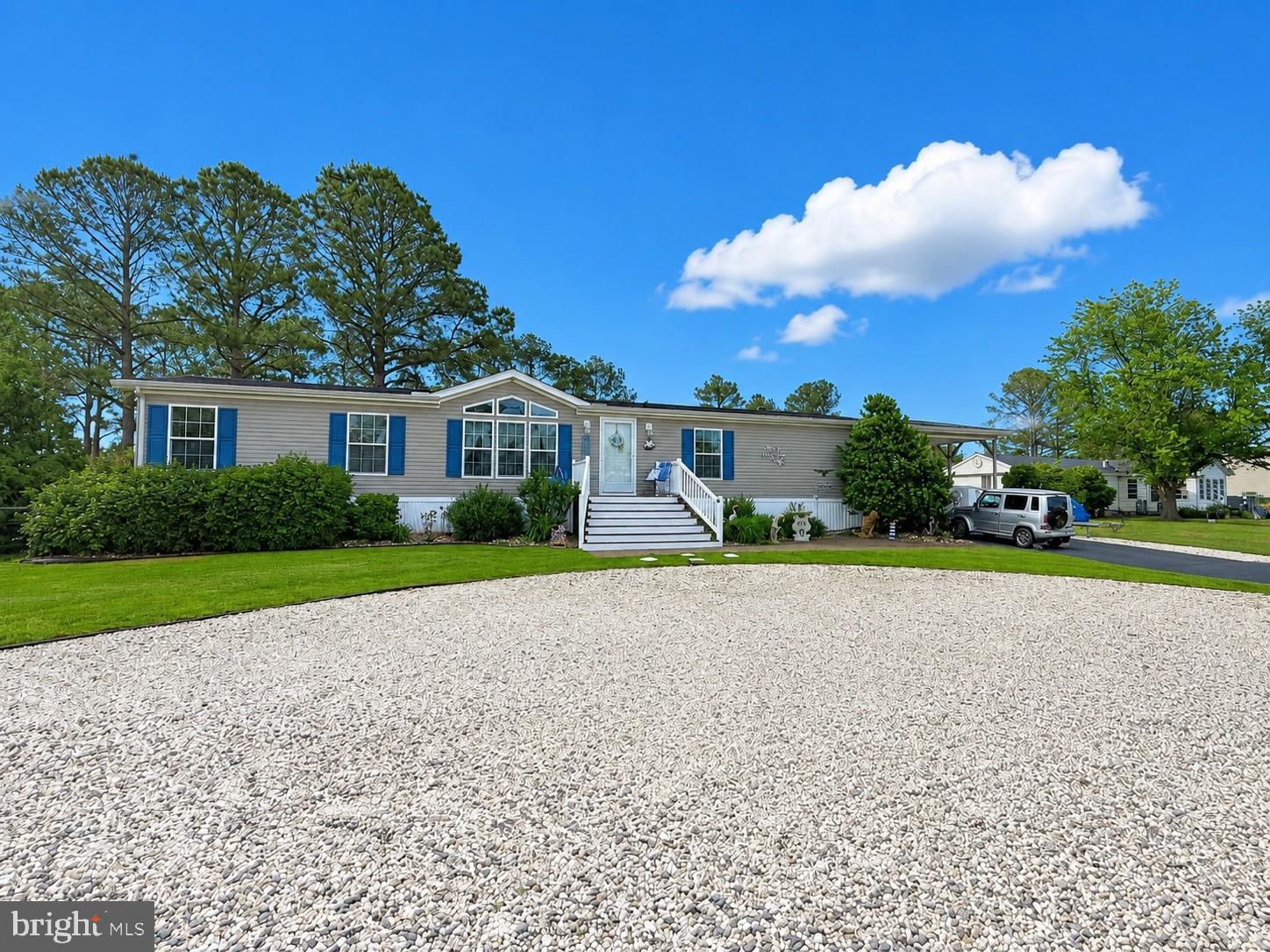 Located in peaceful Pot-Nets Coveside, this waterfront home offers the coastal lifestyle buyers dream about. With approximately 118 feet of bulkhead waterfrontage, there is plenty of room for your boat, jet skis, and all your water toys right outside your back door. Relax on the waterfront patios, enjoy the expansive decking, or unwind in the screen house located on the deck while taking in peaceful water views. An outdoor shower adds convenience after a day on the water, making it easy to rinse off before settling in for the evening.

Built in 2008 and offering approximately 2,200 square feet of living space, this home features 3 bedrooms, 2.5 bathrooms, and multiple living areas, including a bright sunroom, front living room, and cozy fireplace living room. Beautiful wood and LVP flooring flow throughout the home, while upgraded quartzite countertops in the kitchen and bathrooms add both style and function.

Outside, thoughtful details continue with soaker hose systems for the potted plants on the deck and landscaped beds, helping everything stay beautiful with ease. A carport and shed provide extra storage, while the asphalt driveway and additional rock parking area offer abundant space for guests, boats, trailers, or off-season parking. A new roof installed in 2025 adds peace of mind. As an added bonus, the screen house and select outdoor and indoor furniture are available for purchase separately, offering buyers an opportunity to enjoy this outdoor and indoor oasis exactly as it is.

If you have been searching for spacious waterfront living with incredible outdoor spaces, room for all your toys, and the relaxed coastal lifestyle Pot-Nets Coveside is known for, this home is a must-see. Schedule your private showing today!
