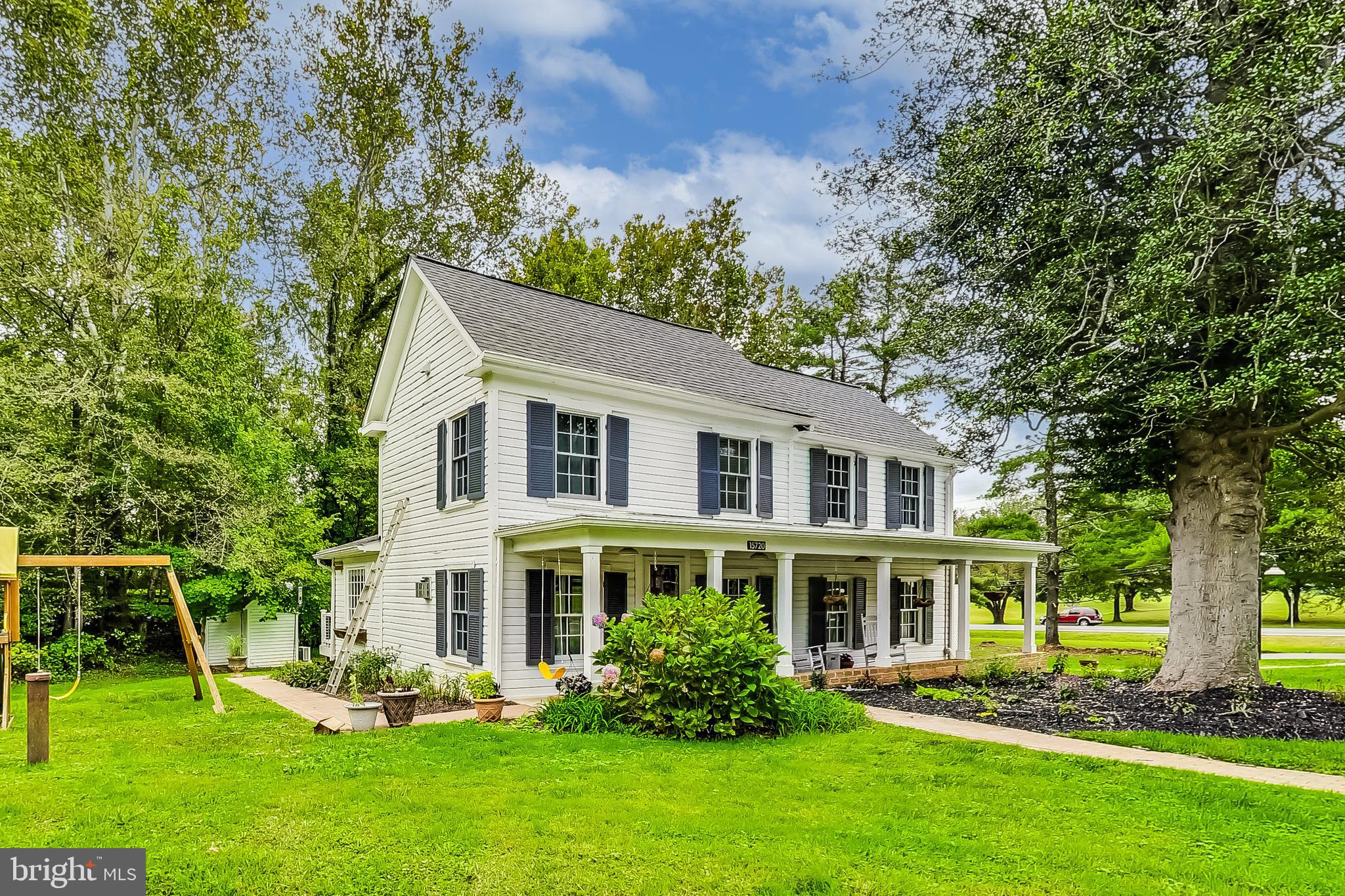 History meets contemporary living in this meticulously restored farmhouse. Nestled in a picturesque setting, this timeless beauty blends historic charm with modern convenience. The property boasts a wealth of recent upgrades, ensuring both comfort and peace of mind. A five-year-old roof and Pella windows adorn the exterior, while a four-year-old, upgraded HVAC system provides efficient heating and cooling for year-round comfort. Inside, no detail has been spared. Upgraded electrical service, a new electrical panel, wiring, and plumbing promise safety and functionality. The entire home has been thoughtfully reinsulated, covering walls, attic, and floors. The heart of this farmhouse is the charming kitchen with reclaimed heart pine flooring throughout the main level. Recessed lighting, Bosch stainless steel appliances, custom-made cabinetry, and built-ins, as well as hand-glazed tile backsplash, add an artistic touch to this gourmet kitchen. The updated and expanded tile bathroom offers a spa-like retreat and you'll also find historic touches throughout, including a gas stove in the entrance and the privilege of owning the second oldest Holly tree in Maryland. This property includes two heated and cooled outbuildings. The larger of the two was once a general store, perfect for a home-based office or business, complete with an EV charging outlet. The smaller outbuilding offers a tranquil reading nook—a private escape from the world. This farmhouse is more than just a home; it's a piece of history awaiting its next chapter. Don't miss the chance to make it your own.