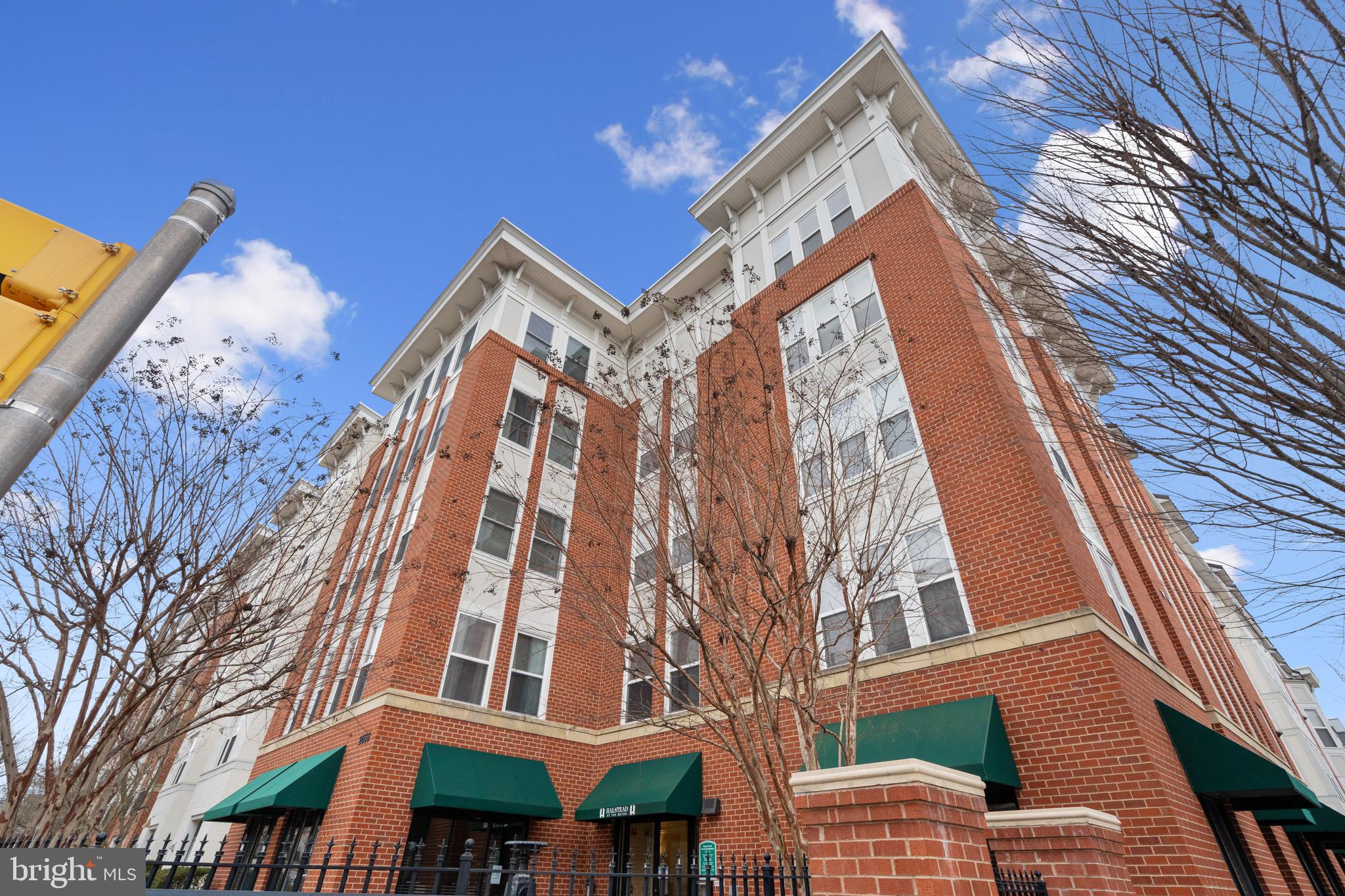 Discover your dream home at Halstead at the Metro! This stunning, light-filled 1-bedroom, 1-bathroom condo is nestled in the heart of a vibrant neighborhood. Just steps away from the Dunn Loring-Merrifield Metro Station and a short 15-minute stroll to Fairfax’s Mosaic District, where you’ll find over 90 shops, restaurants, and entertainment options.

This turnkey condo offers an open and airy layout, ideal for modern living. With spacious storage throughout and a private walk-out stoop that overlooks the serene pool and gardens, this home truly stands out. The inviting foyer leads into the expansive living area, seamlessly connecting to a stylish kitchen with granite countertops, ample cabinet space, and a breakfast bar perfect for entertaining guests.

Convenience is key, as well as a large walk-in closet and in-unit washer and dryer. Plus, the building features secure key fob access, providing peace of mind. Step out to enjoy top-tier amenities, including a state-of-the-art fitness center, pool, concierge service, indoor basketball court, business center, and party room. For added convenience, you'll find an electric car charging station and a nearby private dog park.

Parking is a breeze with 1 assigned space in the gated garage. With its prime location, commuting to DC is effortless, whether you’re walking to the Metro or driving with easy access to I-495, 66, 29, and 50. See for yourself—your new home awaits!