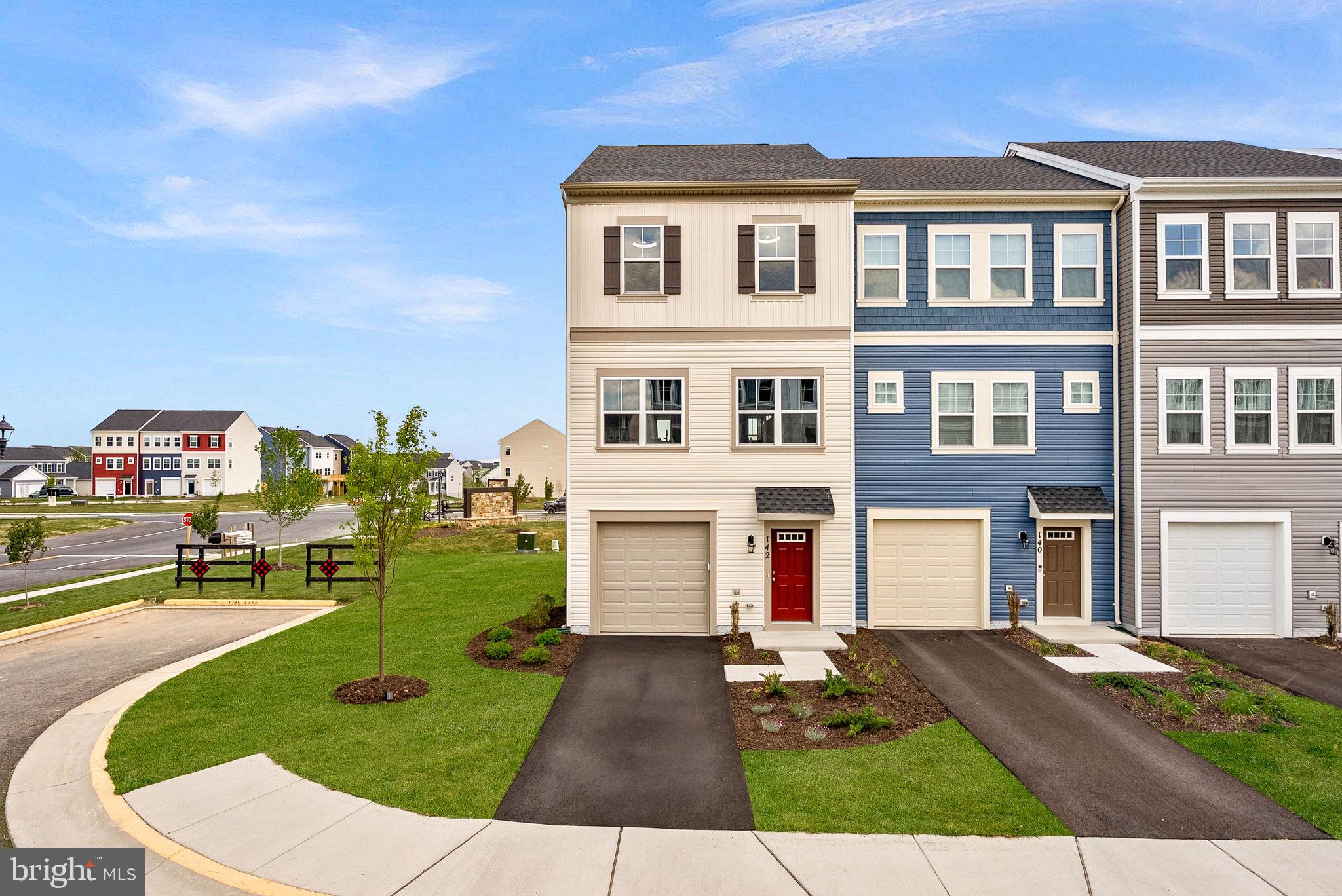 End-unit townhome with exceptional community amenities, nestled just outside of the Blue Ridge Mountains! Luxury vinyl plank flooring flows throughout all three levels. The gourmet kitchen is the heart of the home, featuring white Corian countertops, an oversized island with ample seating, gas cooking, a deep sink, stainless steel appliances, a pantry, and a separate breakfast area with mountain views. The open layout flows seamlessly into a sun-filled family room with large windows and a ceiling fan. Upstairs, the spacious primary suite features a walk-in closet and a spa-like en suite bath with a soaking tub, separate shower, and dual sinks. Two additional bedrooms, a full hall bath, and convenient upper-level laundry complete the bedroom level. The walk-out lower level offers a versatile recreation space, with a half bath, closet, and storage. The home also includes a one-car garage with opener, and EV Charger. Located in an amenity-rich community offering a 15,000 sq. ft. indoor sportsplex, private splash park, bike track, swimming pool, picnic pavilion, trails, dog park, on-site elementary school, and day care center. With its captivating views, convenient location, and hometown feel, Stephenson is the perfect place to call home. Enjoy a variety of outdoor activities nearby, including scenic hiking trails in Shenandoah National Park and picturesque drives along Skyline Drive. Situated just minutes from major commuter routes, shopping centers, and Downtown Winchester, this area offers the perfect blend of convenience and tranquility. Explore local restaurants, historic landmarks, and unique shops in Downtown Winchester, with easy access to I-66 and I-81 for commuting toward Northern Virginia and Washington, D.C. A wonderful home with space, comfort, and lifestyle amenities all in one!