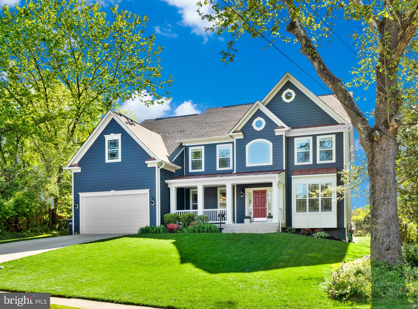 Surely you've heard the phrase, "The best is yet to come." Ever wondered, "OK, great. When?" Well, we have the answer - it's now and it's here! Simply stunning, 2019 Craftsman-style home with over 6000 finished sq. feet on three levels. 7 bedrooms and 5 full bathrooms. This beautiful, sun-drenched home is perfect for both everyday living and entertaining! Handsome hardwood floors throughout the main level which includes an office/conservatory space with French doors, built-in bookcases and wainscoting; a formal dining room with tray ceiling. The gourmet kitchen with white quartz countertop island, dark granite countertops, custom tiled backsplash, stainless-steel GE Monogram appliances and stainless-steel farmhouse sink is open to the breakfast area and expansive family room with gas fireplace. There's also a main level bedroom with a full bath.  A separate staircase leads from the kitchen to the 2nd floor. The upper level with 5 bedrooms is highlighted by a luxurious primary suite with hardwood floors, a large walk-in closet and a spa-like primary bathroom with double vanities, soaking tub, and a heavy glass-enclosed shower. The multi-purpose lower level has a recreation room with a second gas fireplace and a fabulous custom wet bar for entertaining which boasts a unique natural stone countertop and ample open cabinetry. The lower level also has a media room, a huge bedroom with adjacent full bathroom, utility area with storage, and French doors leading to stairs up to the backyard. The exterior includes a lovely stone patio, a fully fenced backyard and a large shaded front porch, perfect for sitting and watching the world go by. Whew! And we haven't even talked about location, yet! The home is nestled in a quiet, well-established neighborhood in the heart of McLean. Only 3 miles to Tyson's Corner with over 300 specialty and retail stores, more than 40 dining options and a 16 screen movie theater.  1 mile to McLean High School. 8 miles to Great Falls National Park with over 15 miles of hiking trails and stunning views of the Potomac and the falls. 13 miles to Reagan National Airport and 14 miles to Dulles International Airport. 2 miles to the McLean Silver Line Metro Station with service to Washington, DC and Dulles International Airport. Just 9 miles to Washington DC and all of the culture,  history, entertainment, dining and recreation the city has to offer. McLean High School pyramid! OPEN SAT 5/09 1:00-4:00pm