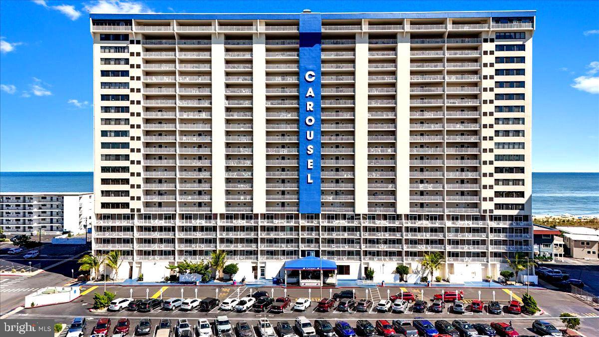 Enjoy breathtaking sun and moonrises from your private 8th-floor balcony, a highly desirable location in this fully furnished and beautifully updated 2BR, 2BA unit at The Carousel. The interior features lots of upgrades with luxury vinyl plank (LVP) flooring, granite countertops, new cabinetry, and a stunning coastal-themed tile backsplash with beach-inspired colors. Stainless steel appliances and tastefully renovated bathrooms with new vanities, tiled/LVP floors, and shower/tub combos complete the space. The Carousel is a year-round resort offering endless activities, including outdoor and indoor pools, an oceanfront restaurant, indoor ice skating rink, arcade, bistro/coffee lounge, beachfront bar, sauna, hot tub, fitness center, pickleball courts, meeting rooms, private garage parking with two passes, and 24-hour security. Conveniently located across from a grocery store, this fully furnished unit is the perfect vacation getaway in Ocean City!