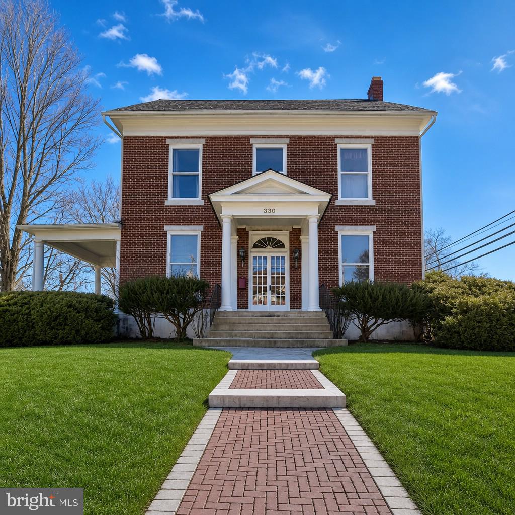 Welcome to historic 330 E MAIN ST, located in the vibrant college town
of Annville.   Featuring a custom built climate controlled 8 CAR GARAGE!!

Step inside and experience a home rich with character: a grand staircase with carved
banister, high ceilings, transoms for ventilation, beautiful hardwood floors, vintage
hardware, and leaded glass windows.  Updates include central A/C, two zones of
natural gas heat, and a tankless hot water system. ensure everyday ease without sacrificing
historic charm.

MAIN FLOOR 
* A 14’ x 27’ great room ideal for entertaining. relaxing or hosting gatherings
* Parlor rooms that can serve as home offices, reading rooms, or even a main level
bedroom if desired.
* A dining room large enough for a table of twelve.
* A custom Colonial Craft kitchen featuring solid oak cabinetry, a brand-new
dishwasher and gas range, and a conveniently located half bath.
* A mudroom that doubles as a laundry area and extra storage.

UPSTAIRS 
* A spacious primary bedroom with ensuite bath and access to an expansive private side
porch.
* Two large adjoining bedrooms across the hall, plus a fourth bedroom and an additional
full bath.
* A fifth smaller bedroom, currently set up as an indoor “Catio.”
* Three hallway closets, including a generous walk-in cedar closet.
* A vaulted attic and unfinished basement provide exceptional storage and future
possibilities.

OUTSIDE
* A slate roof accented by charming gingerbread siding.

 *A serene backyard with mature shade trees, privacy hedges, a secure chain-link dog
run, grilling patio, and fire pit.
 *A detached two car garage plus a central parking pad accommodating three additional
vehicles.
 *And the showstopper: a custom built, 1,600 sq ft, eight car man cave with central A/C
and radiant floor heat—ideal for vehicles, hobbies, collectibles, or creative workspace.

WALKABLE SMALLTOWN LIVING
Stroll to the town square for pizza or morning coffee. Visit the local library, catch a film at the
renowned Allen Theatre or enjoy the trails and fishing along the Quittapahilla Creek.
Schools—elementary through high school—are close enough for kids to walk, just like in the old
days.

LIVE, WORK, PLAY ON MAIN ST. USA
Work from home in comfort, or enjoy an easy commute with major north–south and east–west
routes just minutes away. This is a rare opportunity to own a piece of Annville history with the
space, updates, and amenities to fit modern life.

Back on market at no fault of the seller or the home.  Contact agent for more details.