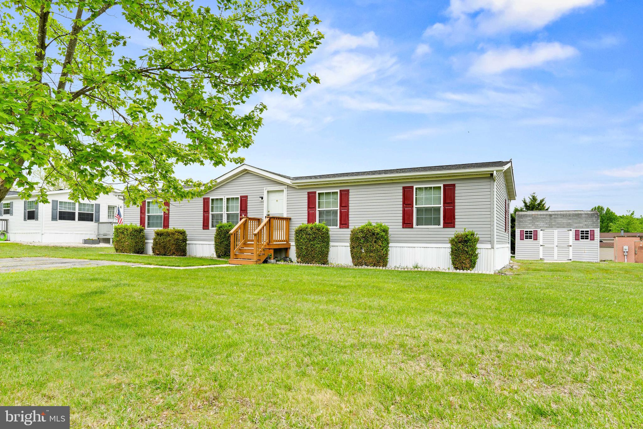 Vey well maintained double wide in the sought after community of Maybelle Manor! This home has 3 bedroom and 2 full baths. The owners suite has a walk-in closed and a very large attached bath. The kitchen is open to the family room and dining room.  The mud/laundry room has access to the rear deck.  Two additional bedrooms and a flex room off the living room that could be used for a TV room, office, or another bedroom.  Shed included.  Roof was put on in 2025. LOT RENT IS $670/MONTH AND INCLUDED WATER, SEWER, AND TRASH. All appliances included. Nice wide (paved) driveway.  Conowingo Elementary and Rising Sun Middle and High School district. This will be a great home for someone looking for everything on one level!
Buyer must be preapproved or have proof of funds BEFORE touring home. Park approval must be obtained by going to www.umh.com. There is a $50 application fee. Call Maybelle Manor 410-378-3886 with any questions.  There are breed restrictions for dogs. Also, a weight restriction of less than 50 lbs.